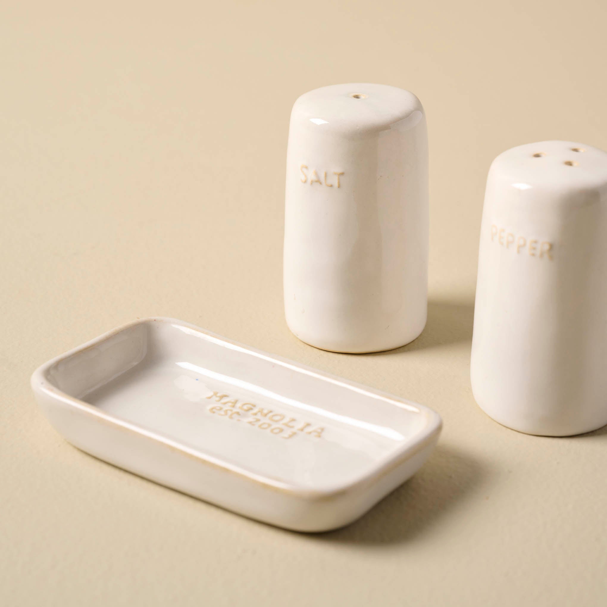 Magnoliass Est. Salt and Pepper Shakers off of the included dish