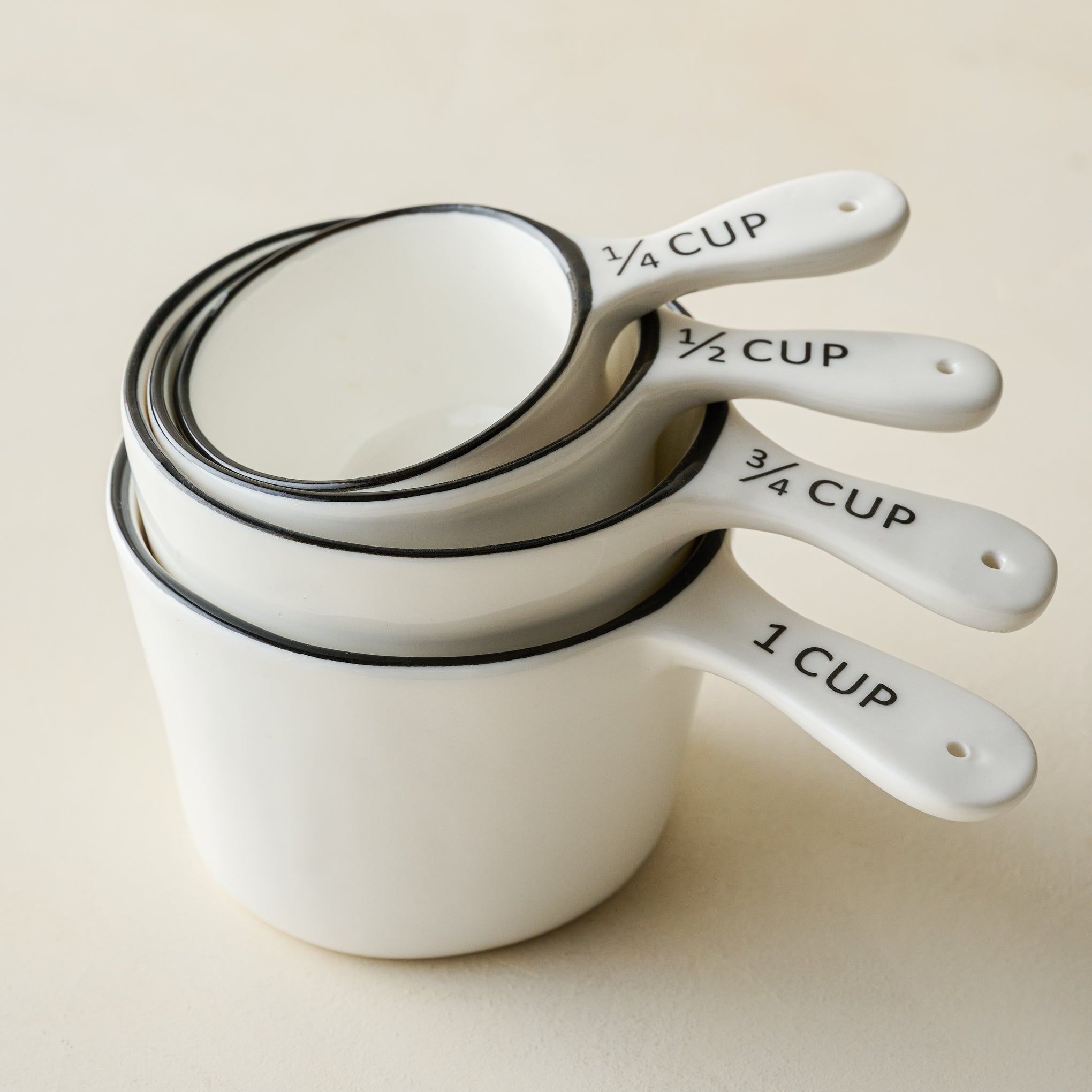 Magnoliass Black Rim Ceramic Measuring Cups stacked