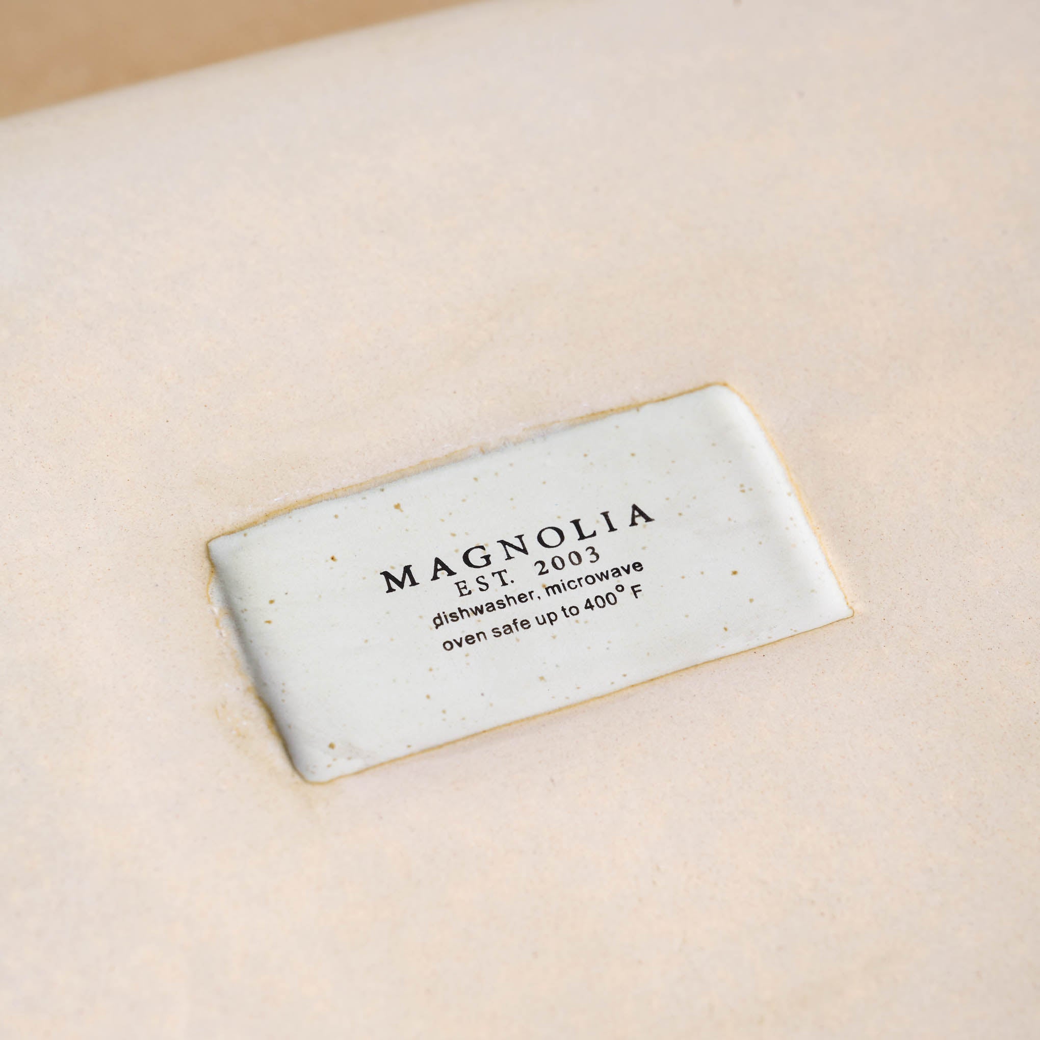 French Grey Baking Dish Set Magnoliass logo on bottom with dishwashing and microwave instructions
