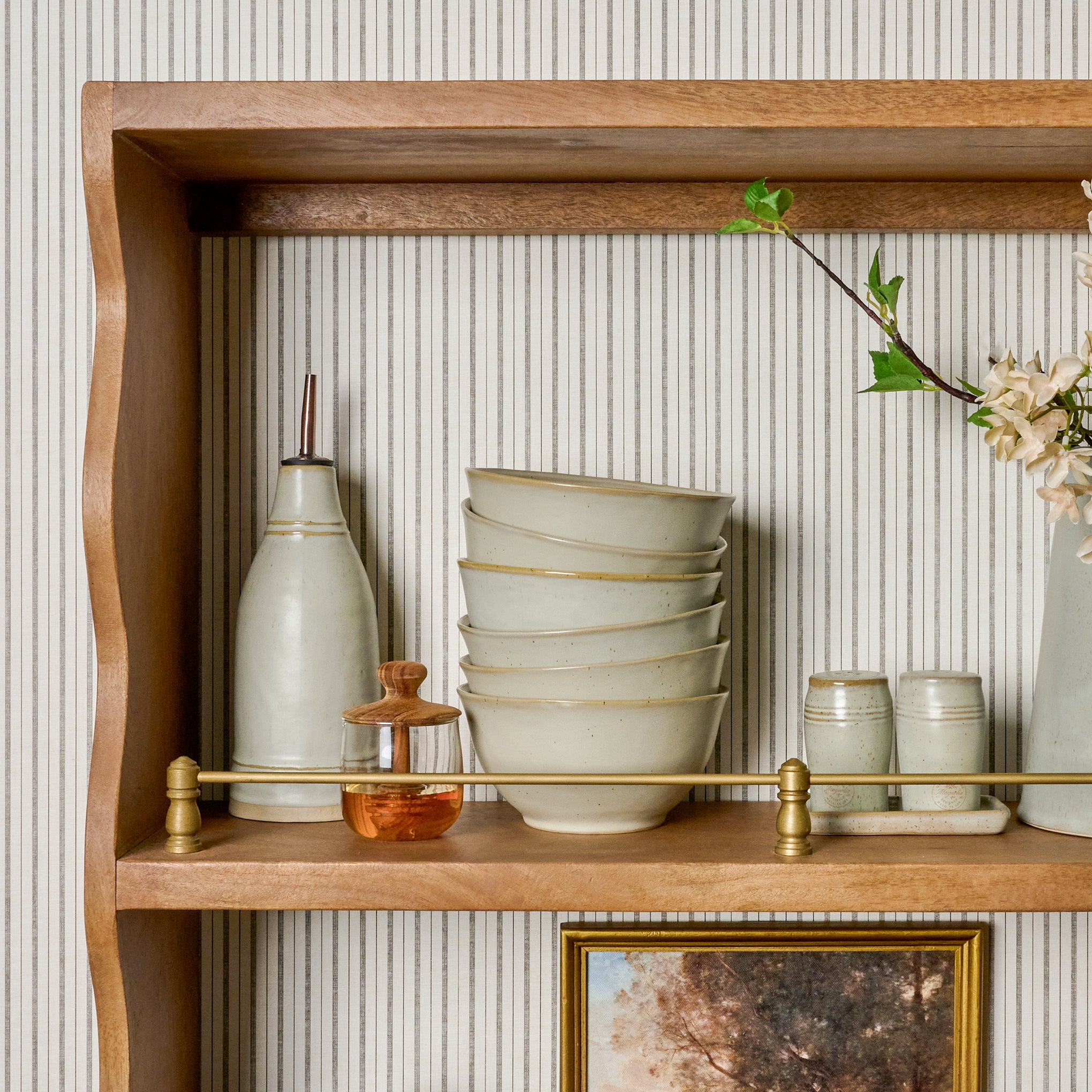 French Grey Vinegar Pour on a wall shelf