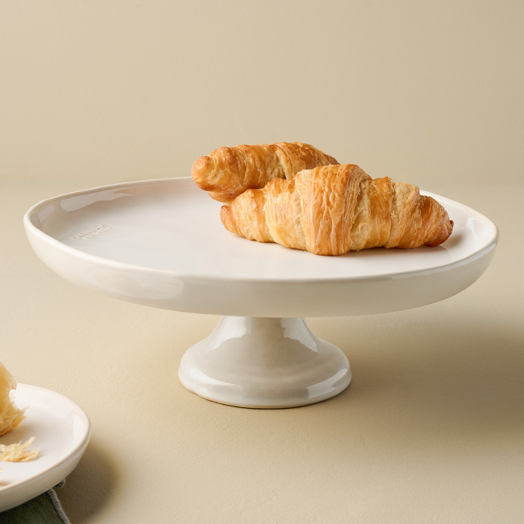 Magnoliass Est. Cake Stand in use with croissants