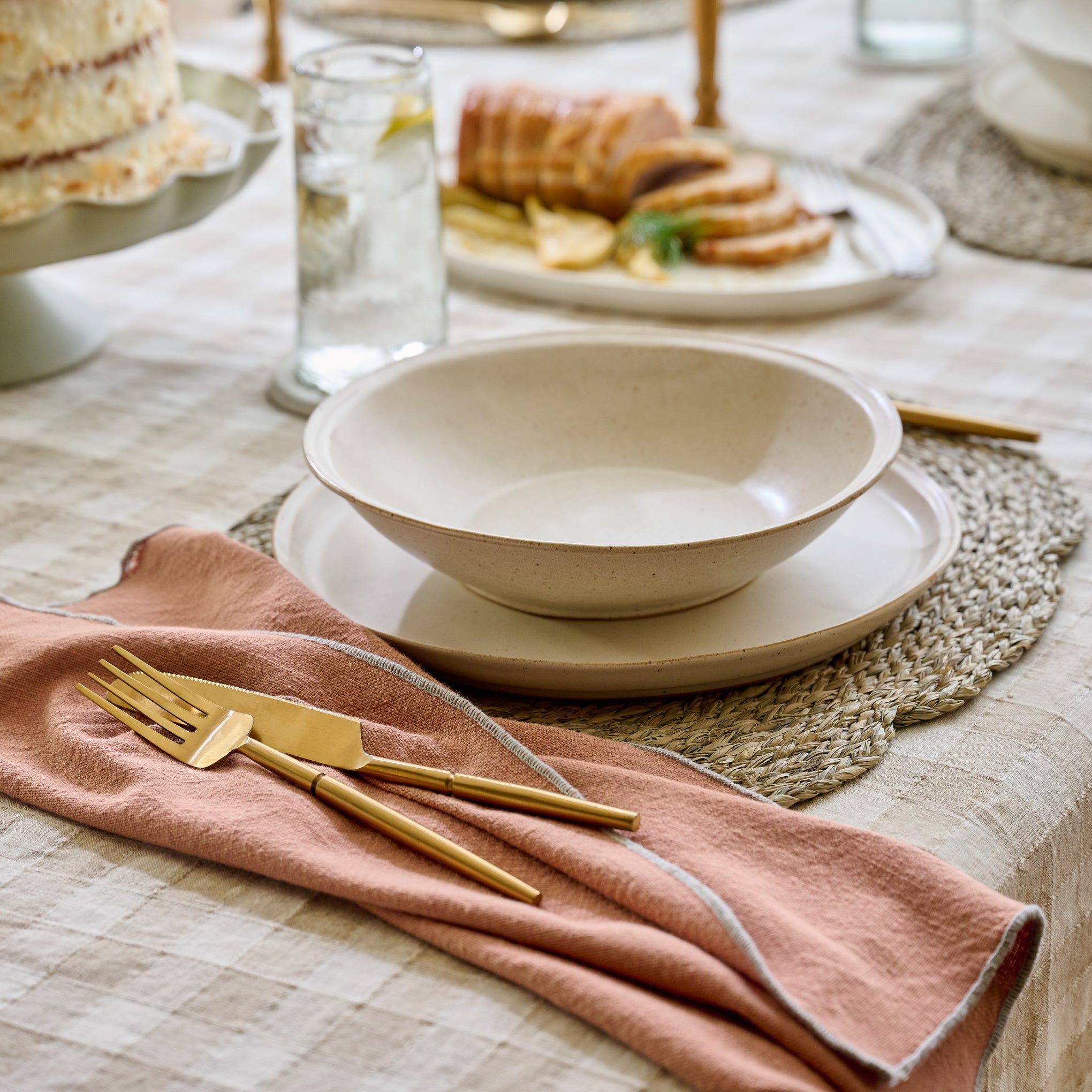 french whie speckle plate with a french white pasta bowl on top