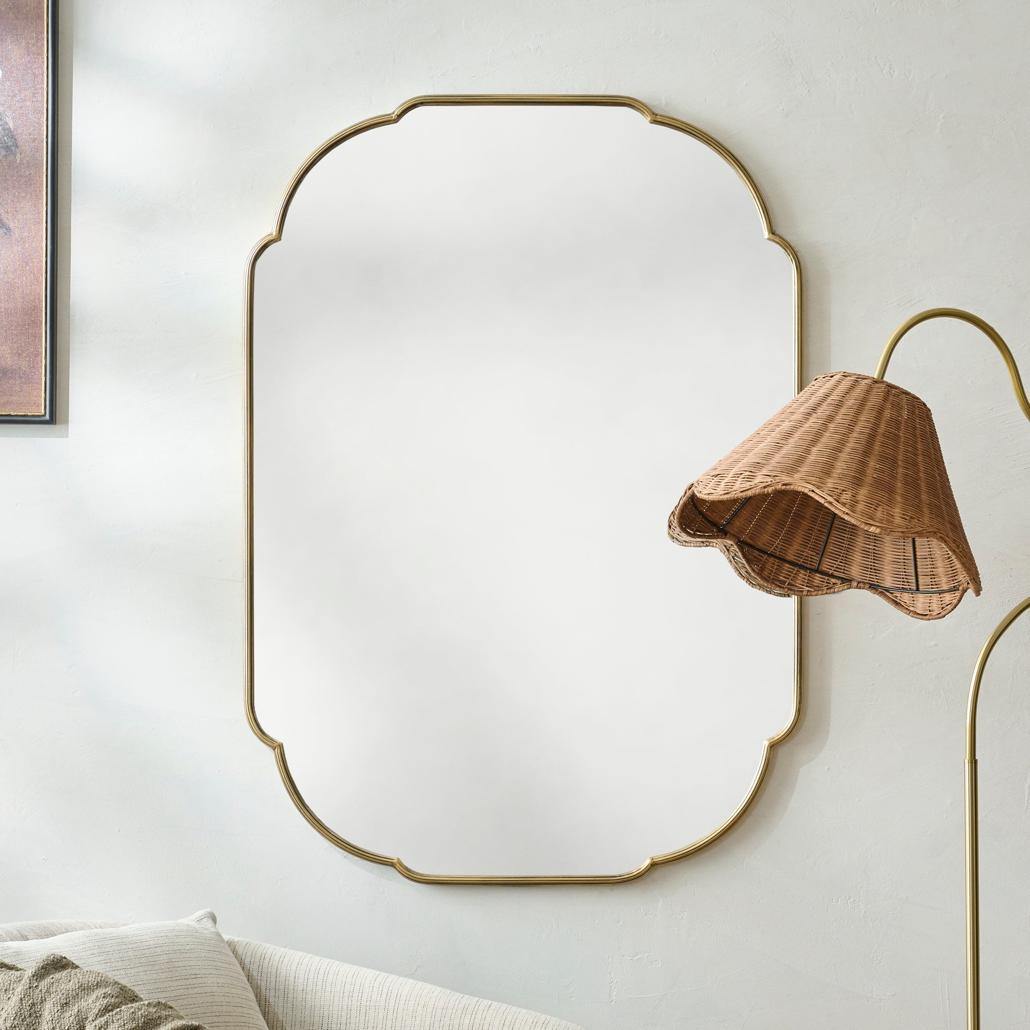 Antique Brass Luna Mirror shown hung on wall
