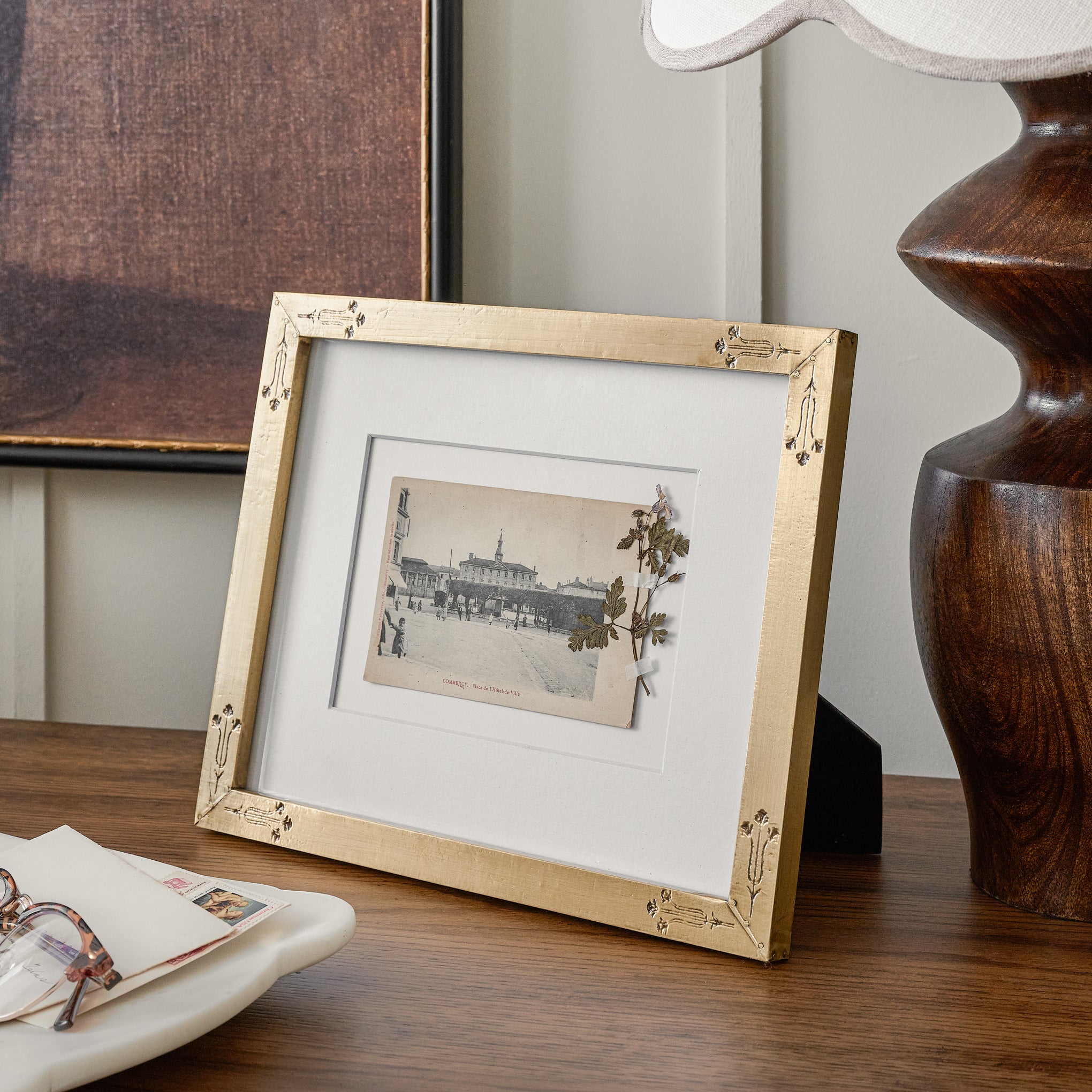 Floral Antique Brass Photo Frame shown on table