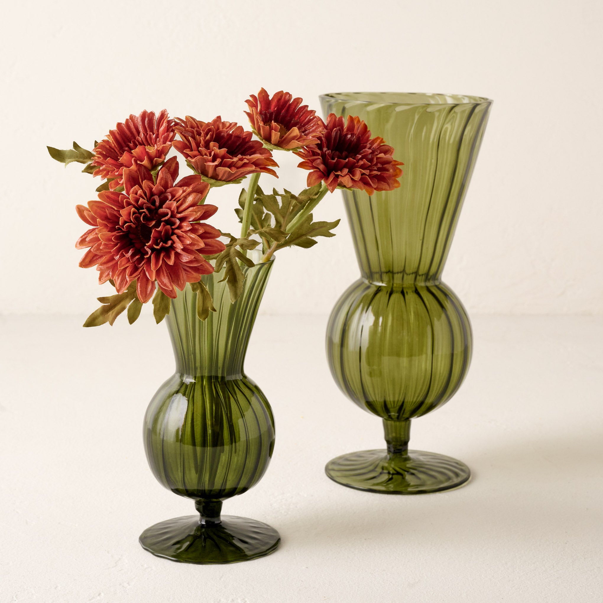 Small and Large Fluted Green Glass Vase shown holding flowers