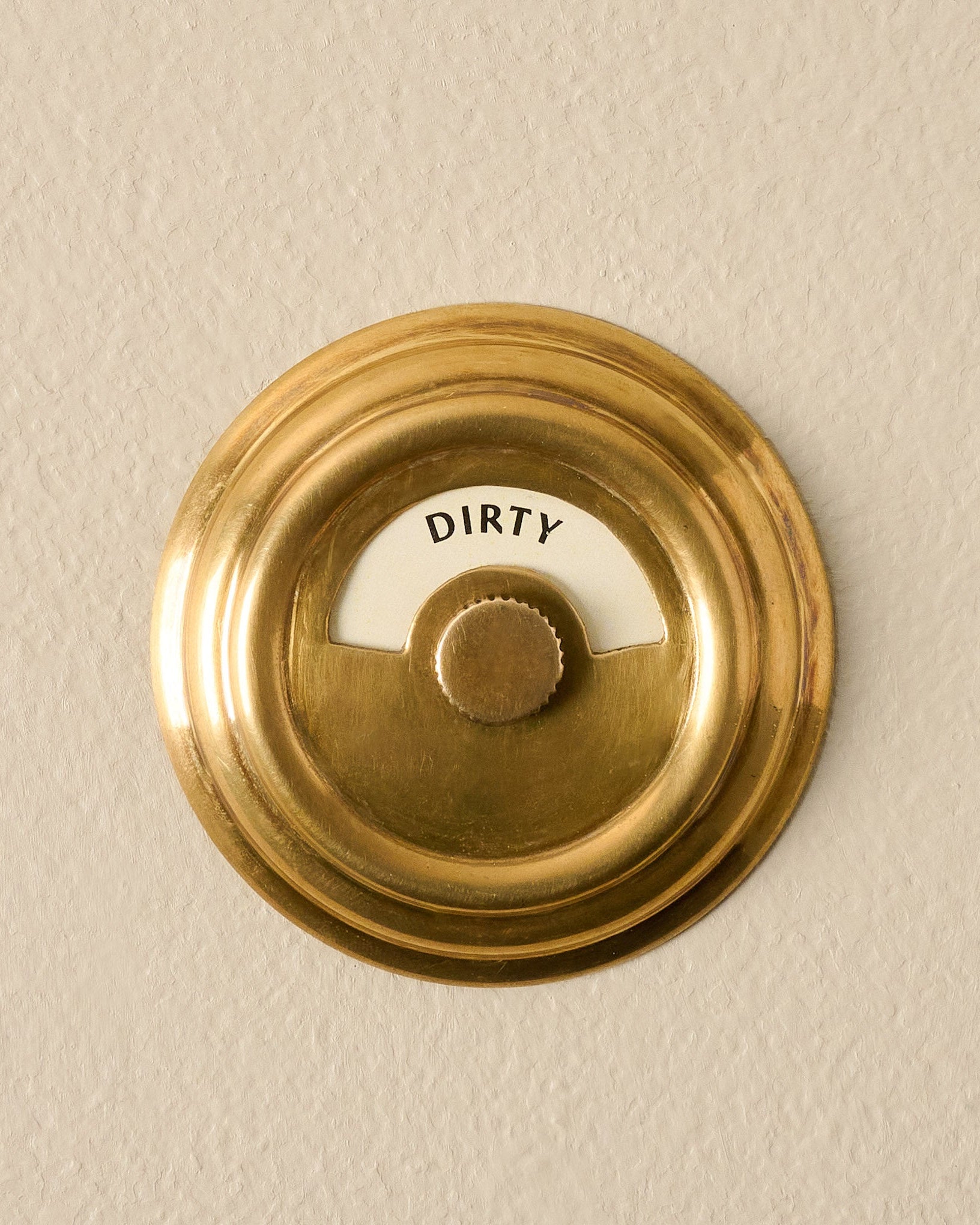 Antique Brass Dishwasher Marker showing "dirty"