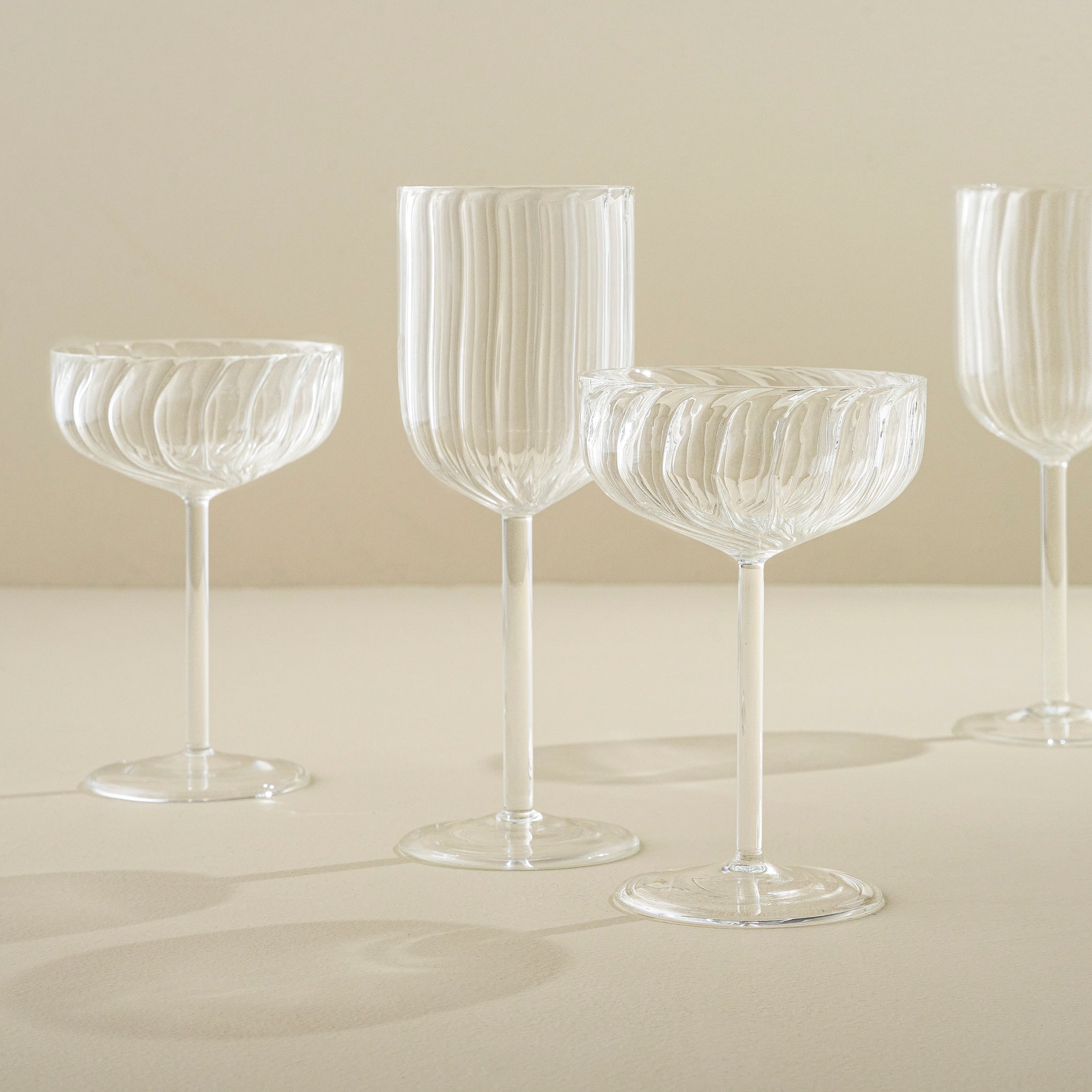 Fluted Coupe Glasses with other glasses