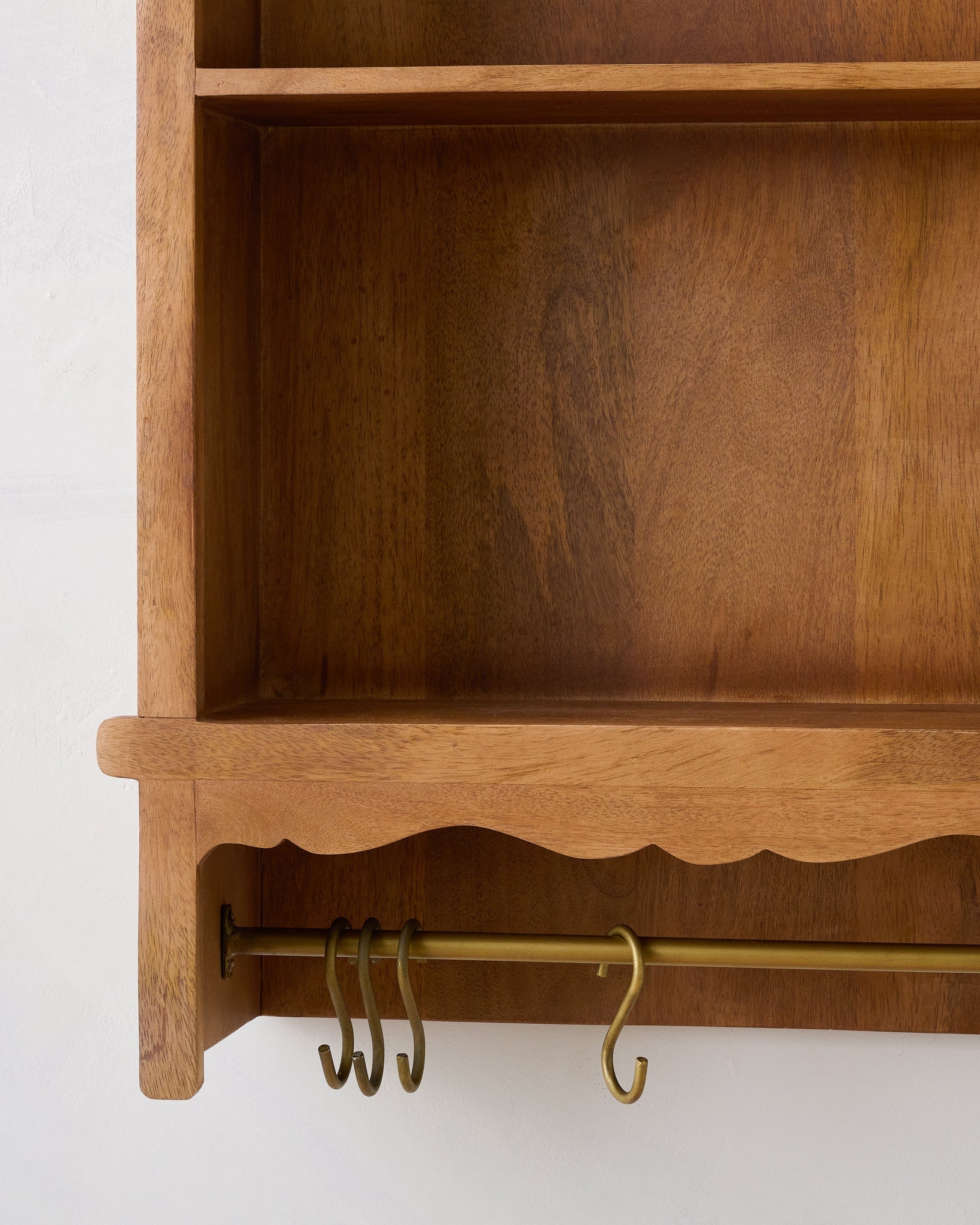 Daphne Wooden Wall Shelf close up of hooks on bottom of shelf