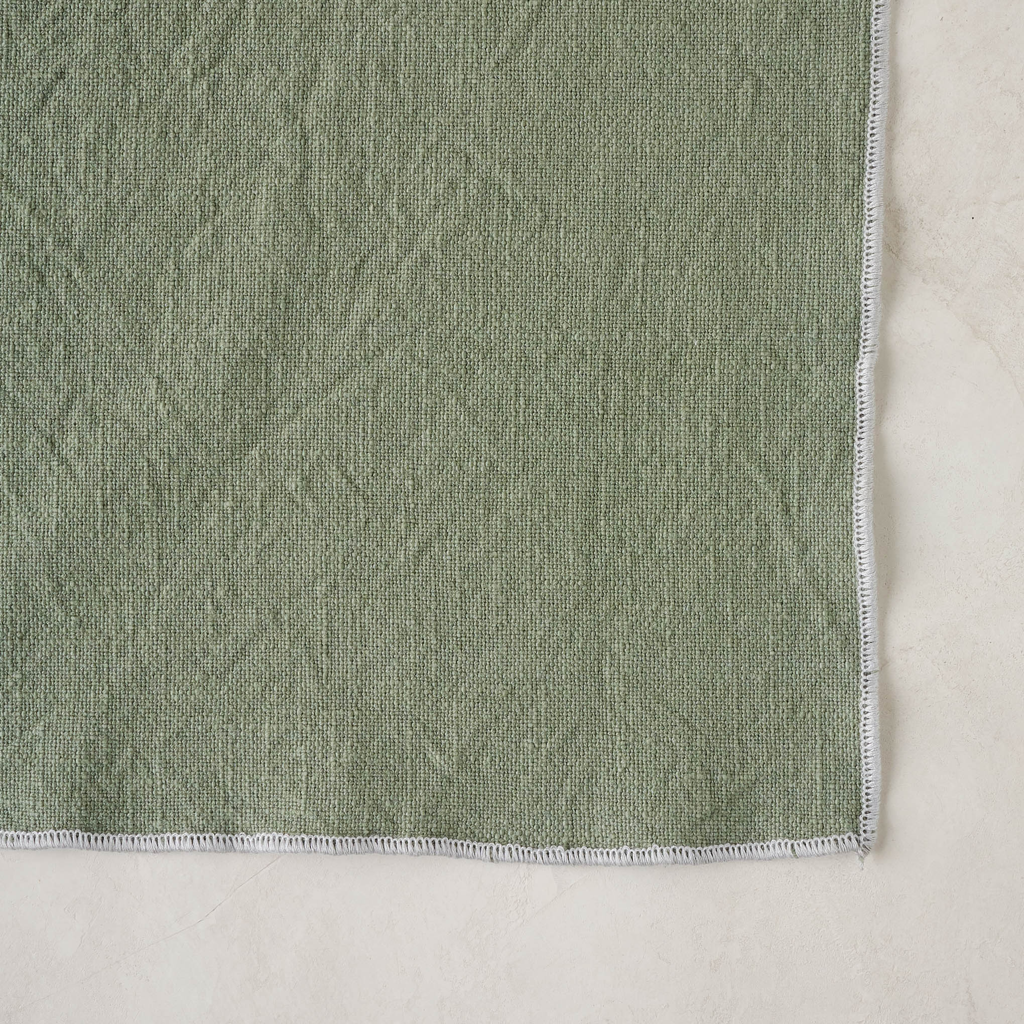 Green Tea Napkin Set of Four close up of corner of napkin