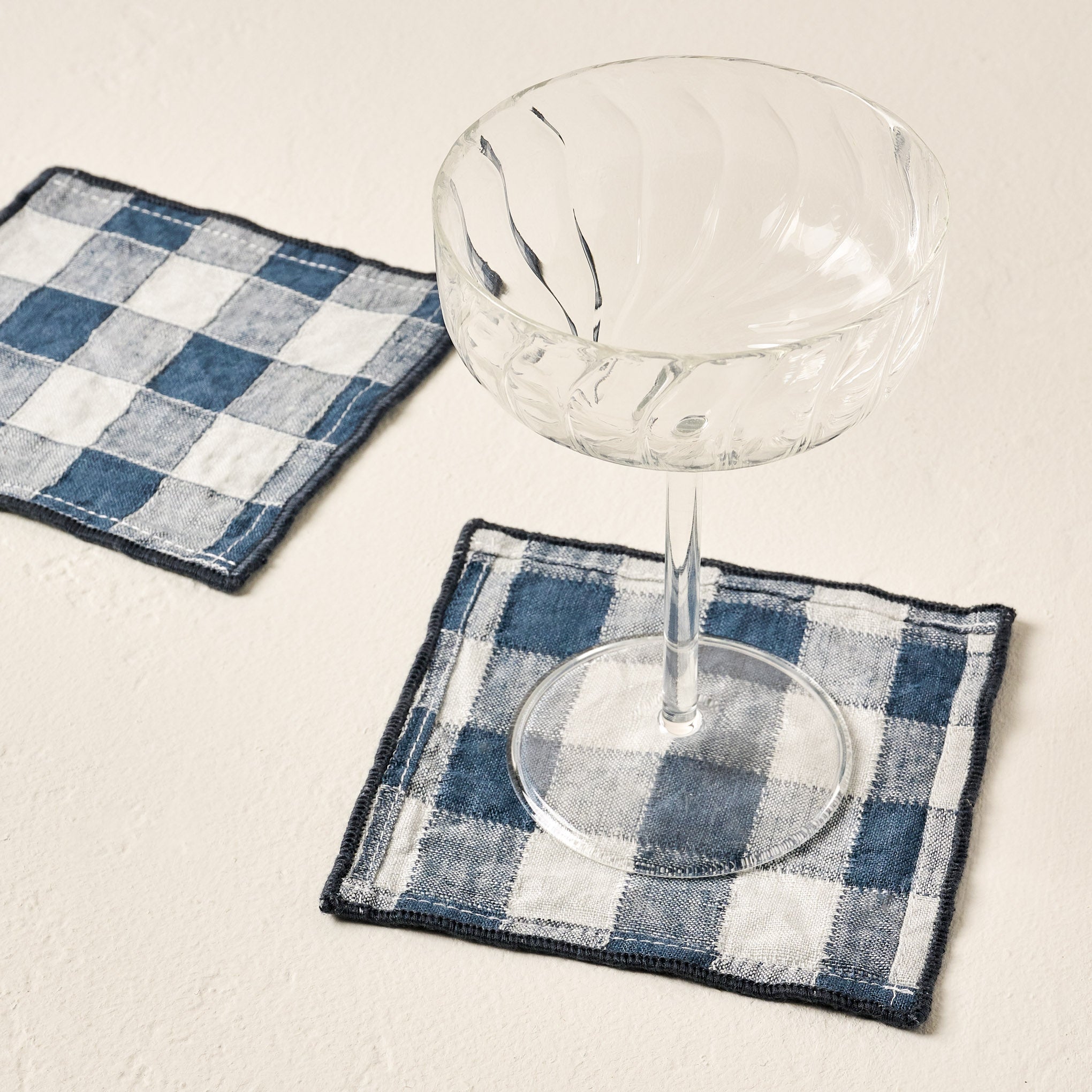 Blue/Grey Gingham Cocktail Napkins Set of Four with fluted coupe glass