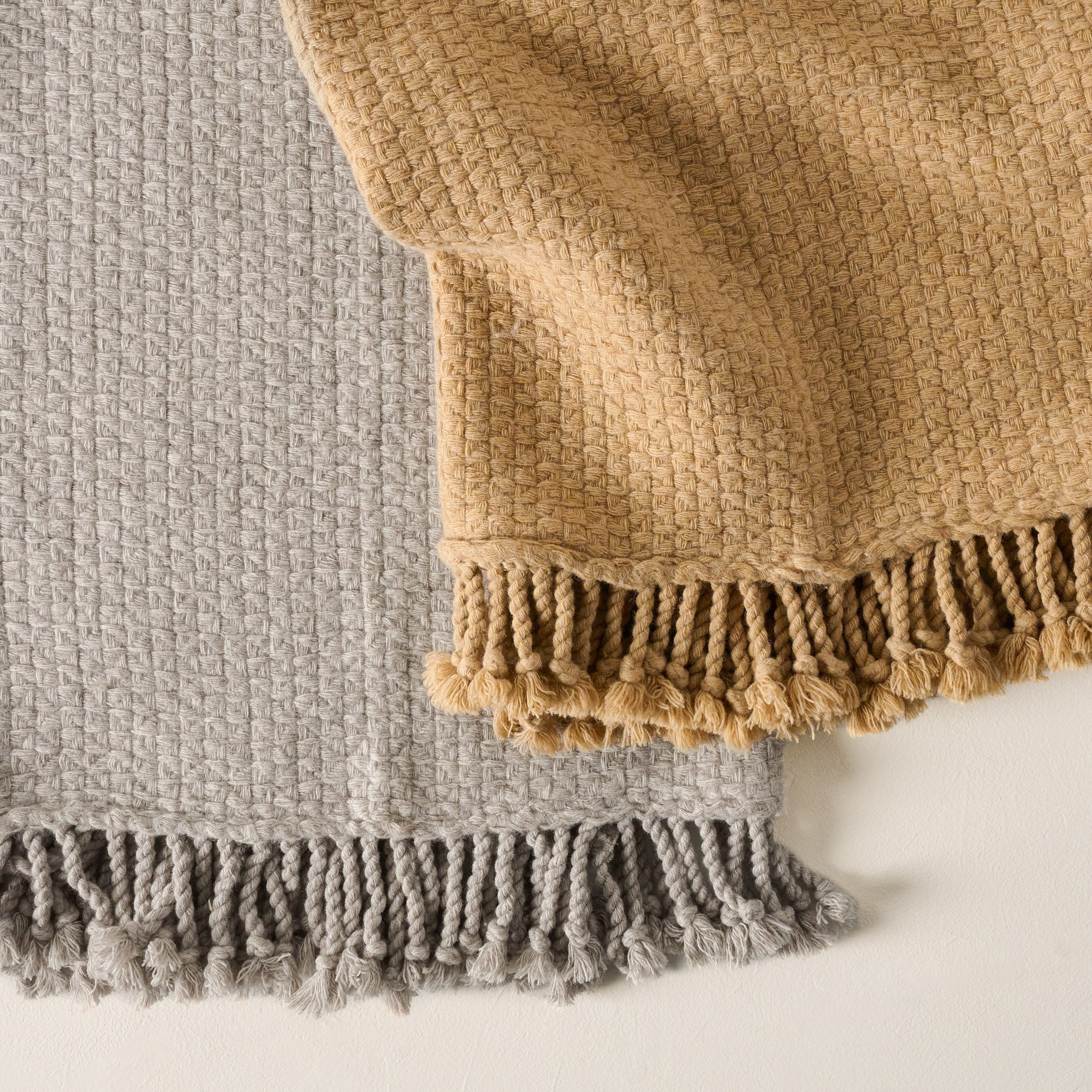 Grey and Ochre Basketweave Throws shown up close