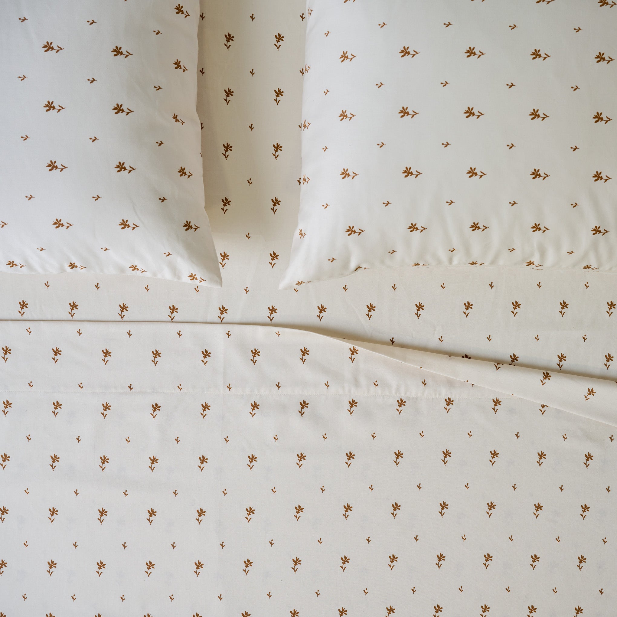 Isla Floral Printed Sheet Set shown on bed