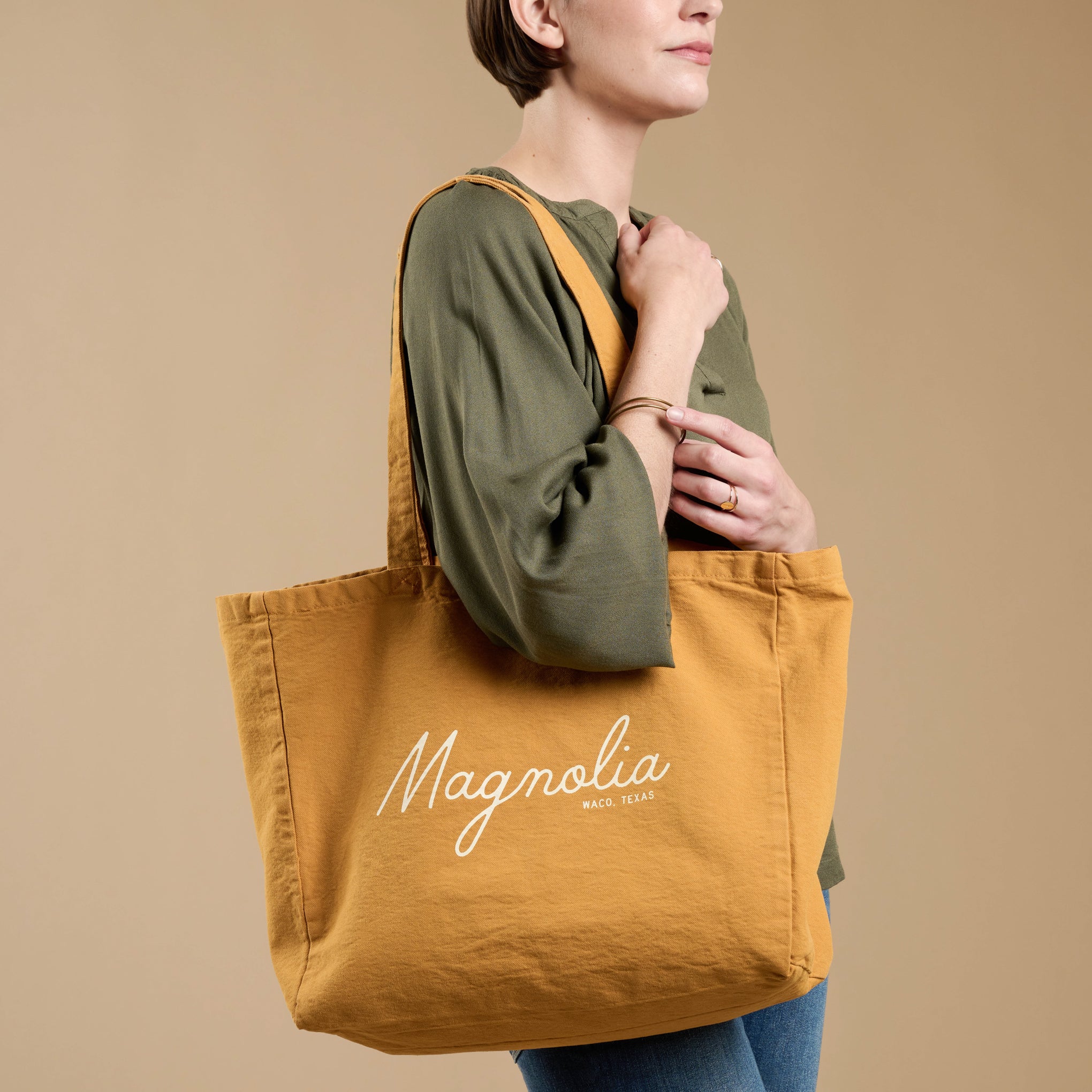 Magnoliass Gold Script Tote on model