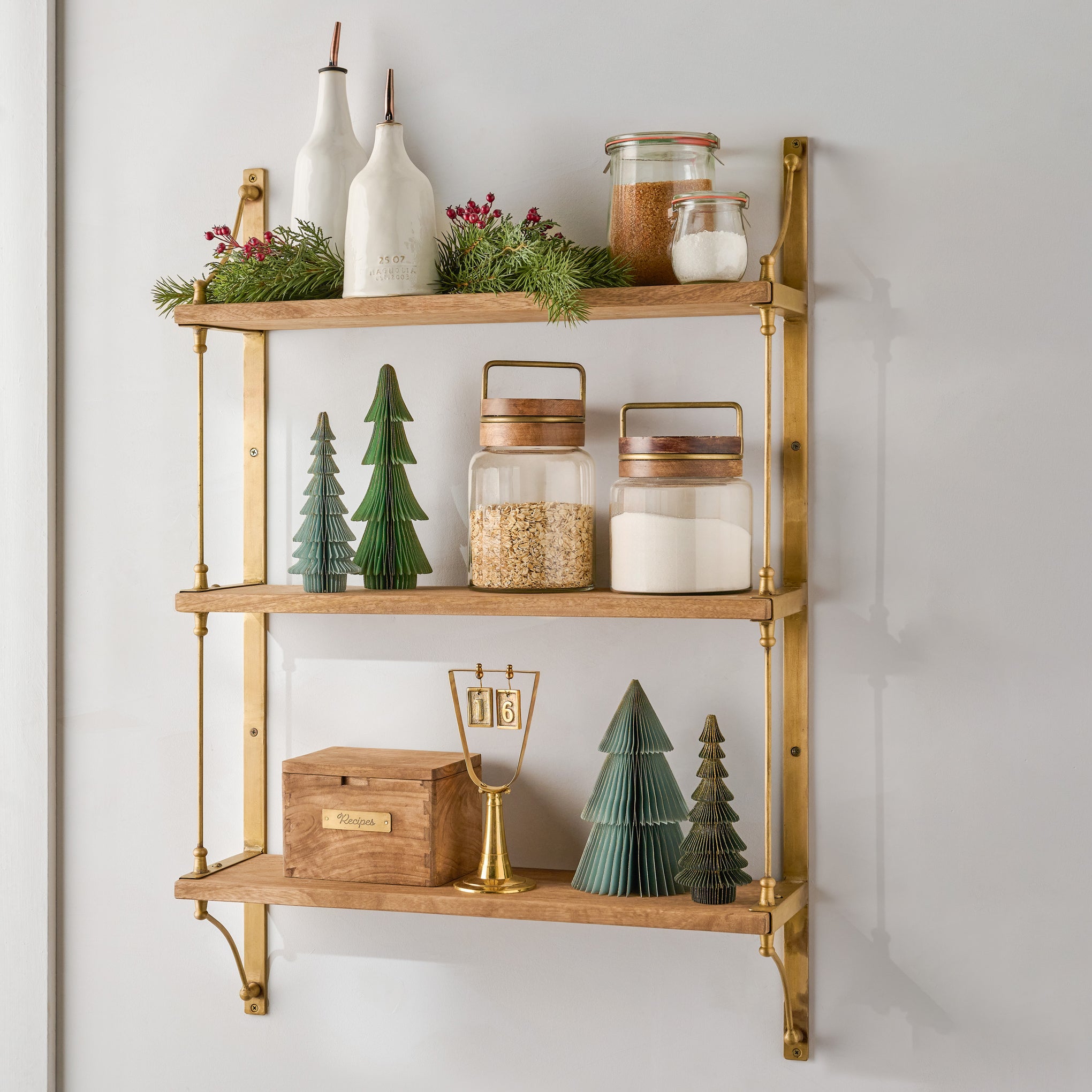 Triple Parker Brass and Wood Shelf shown with Holiday decor and kitchen goods