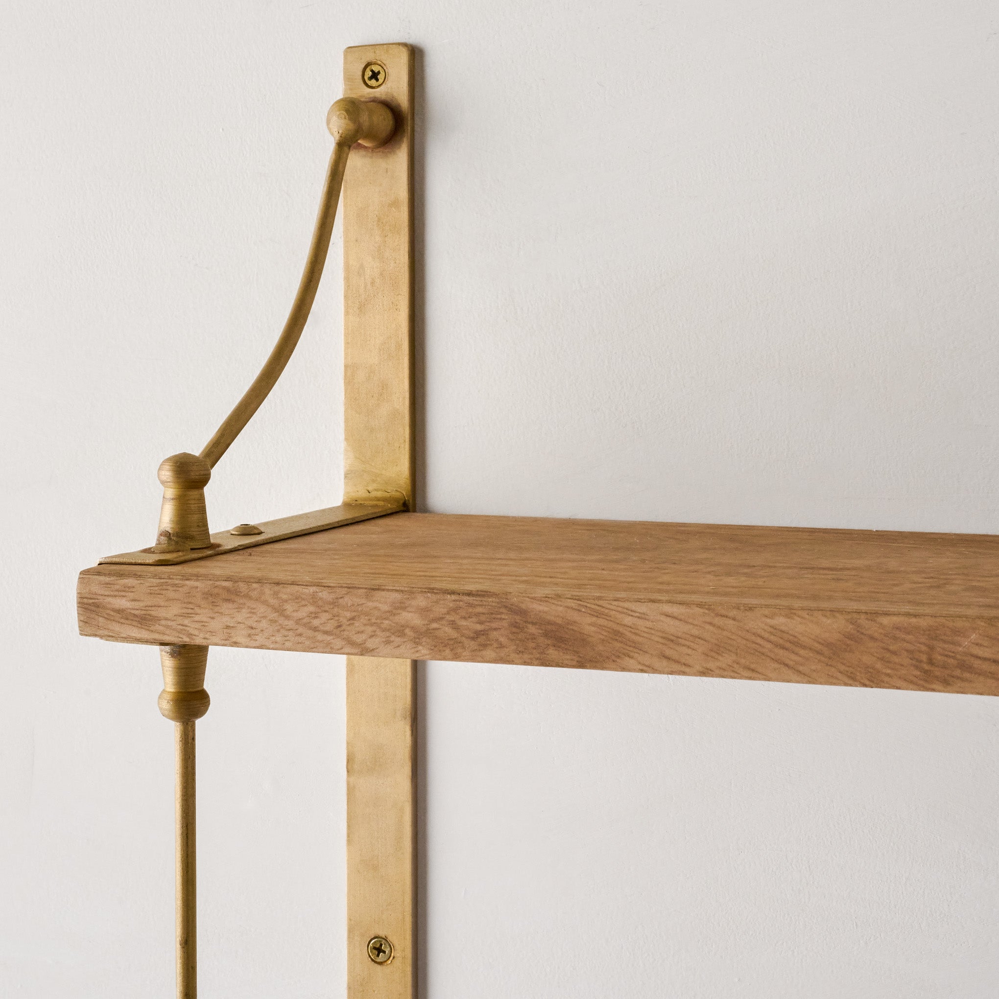 Triple Parker Brass and Wood Shelf top up close