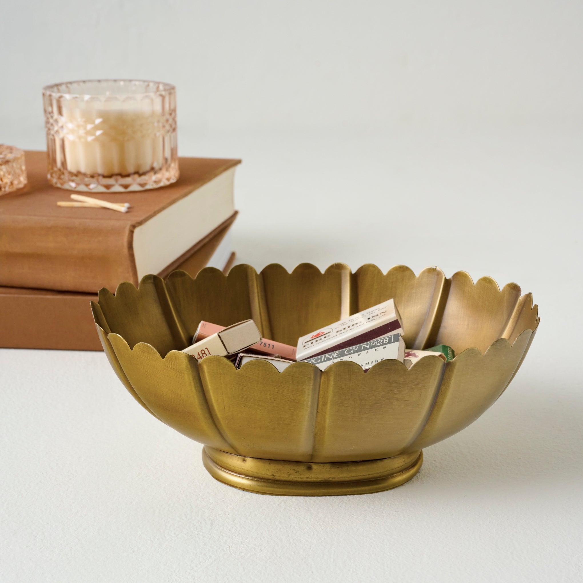 Palmer Brass Scalloped Bowl shown with matchboxes