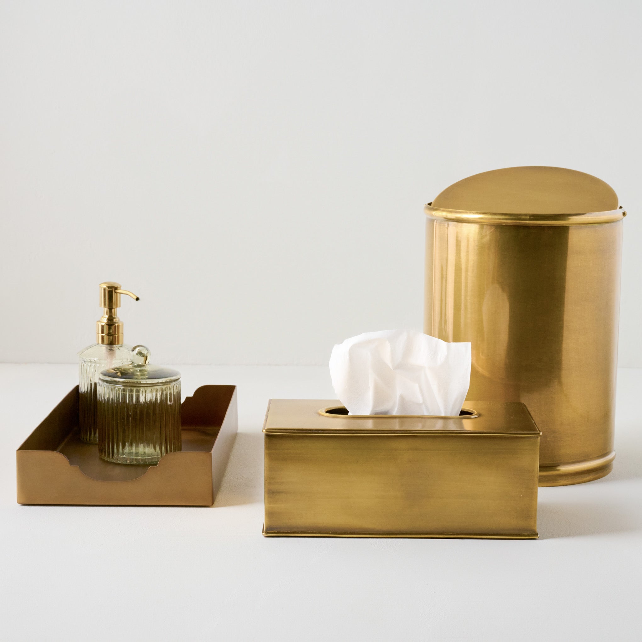 Antiqued Brass Tissue Box Cover shown with other bath accessories