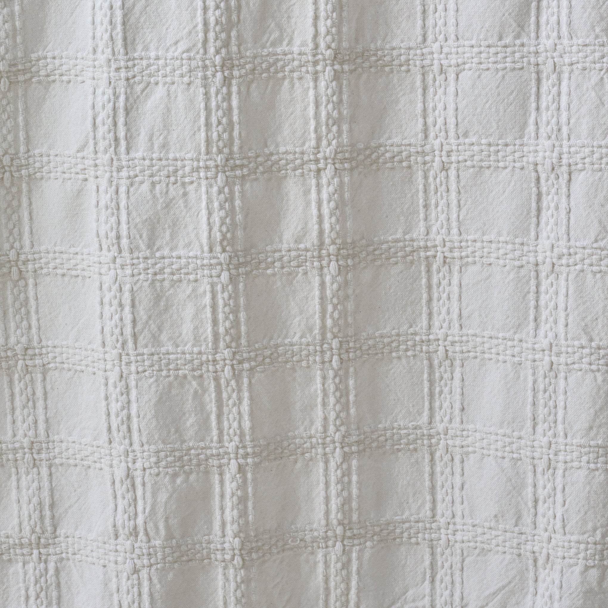 White Textured Shower Curtain material up close