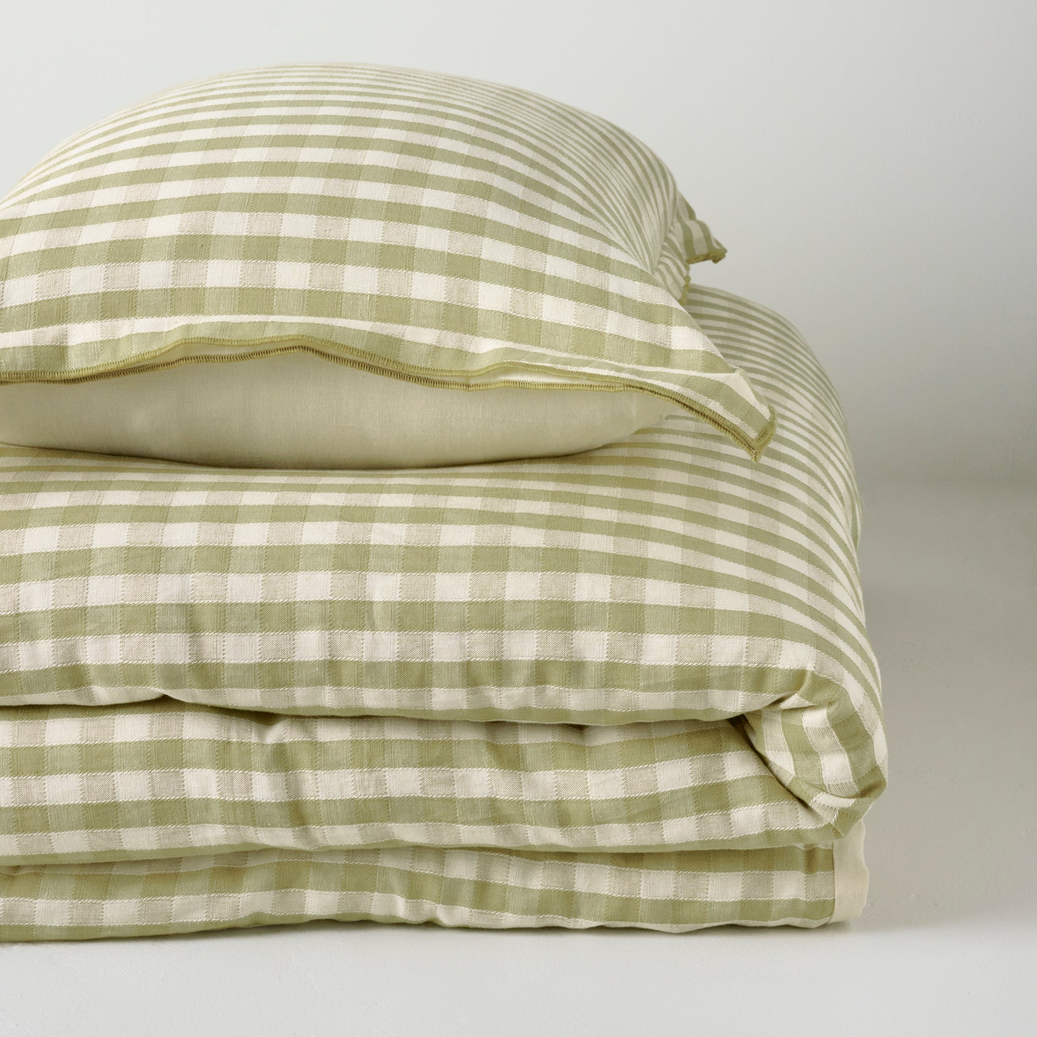 Maxine Gingham Sham shown with duvet