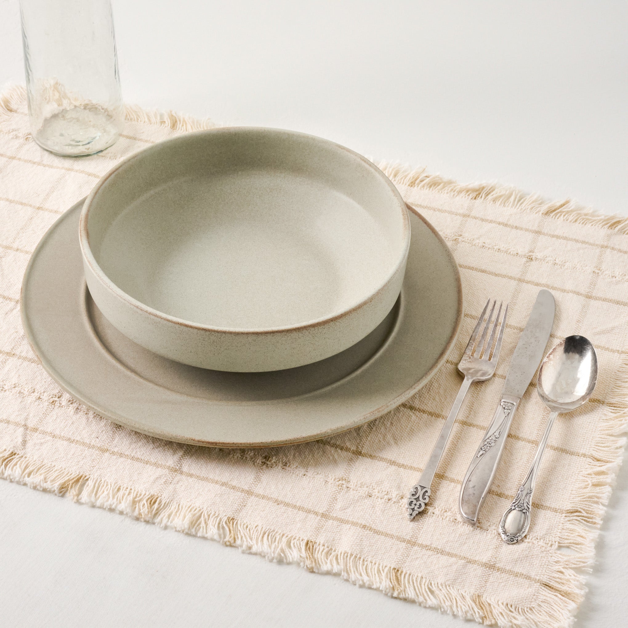 Woven Grid Placemat Set of Four shown with place setting