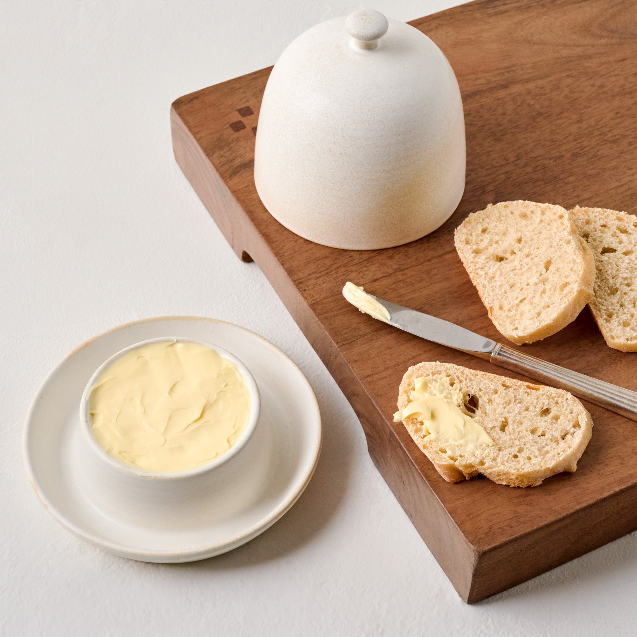 French White Butter Dish shown with butter and bread