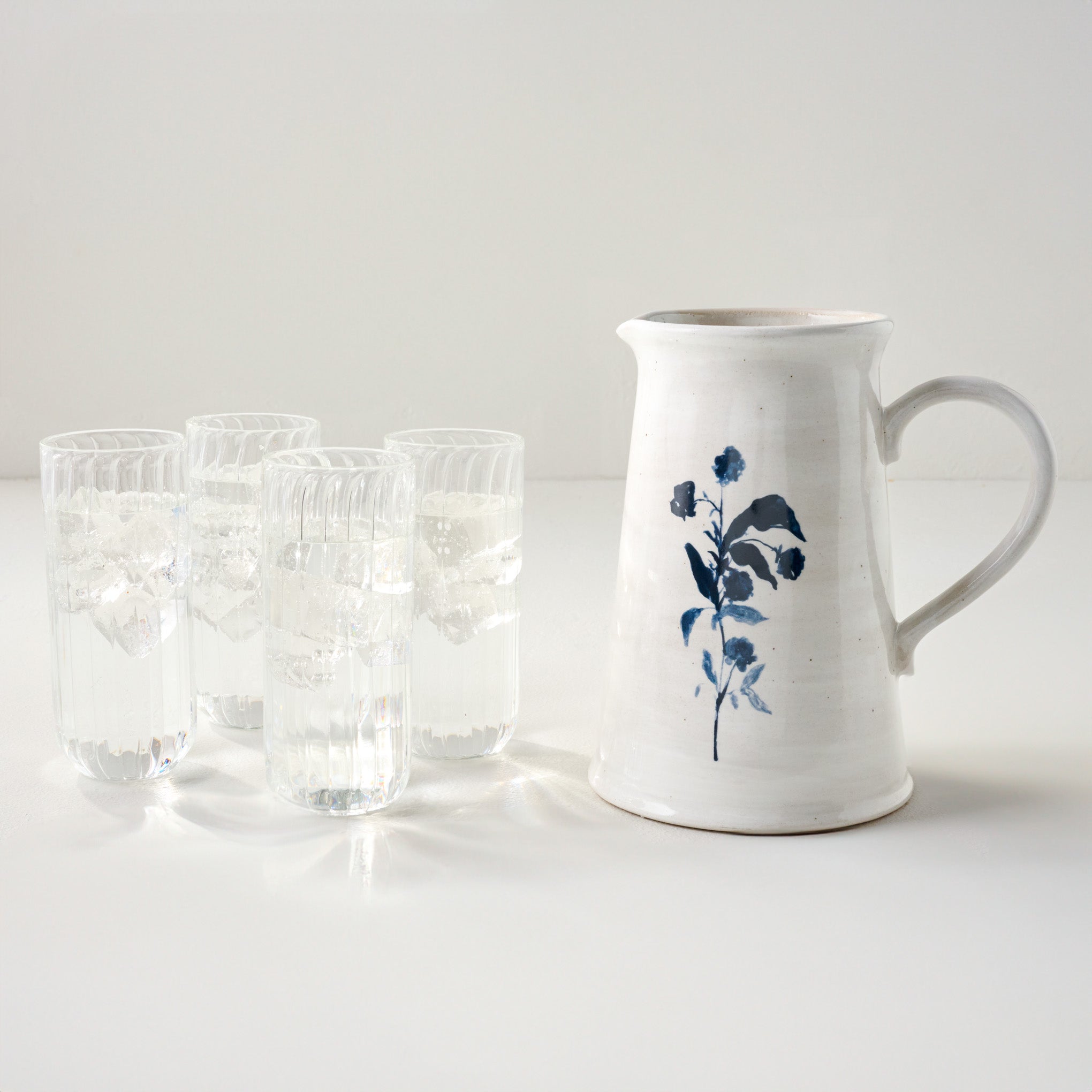 Fluted Glass Tumblers shown with Lila Floral Pitcher