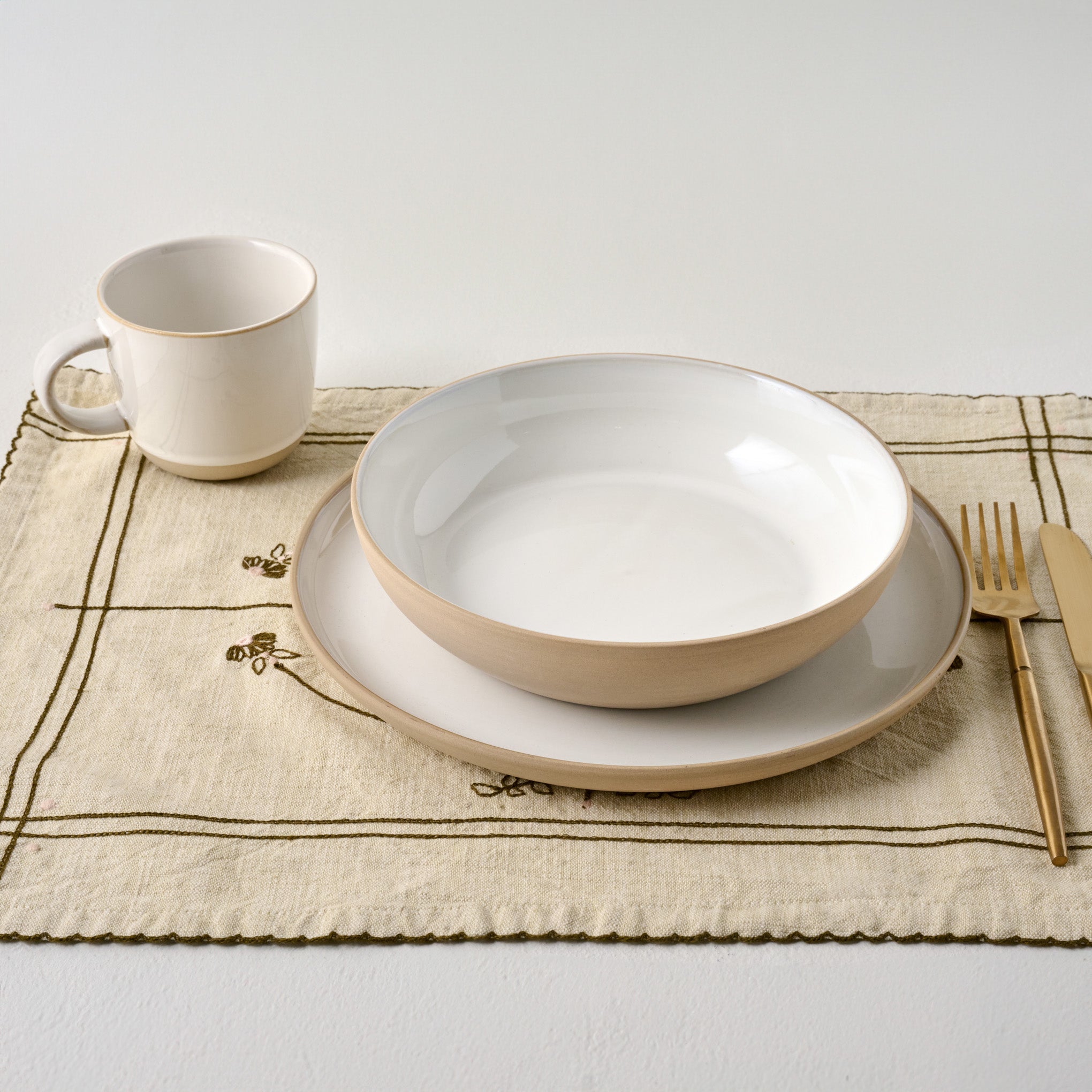 Stone White Lakelynn Mug shown with place setting