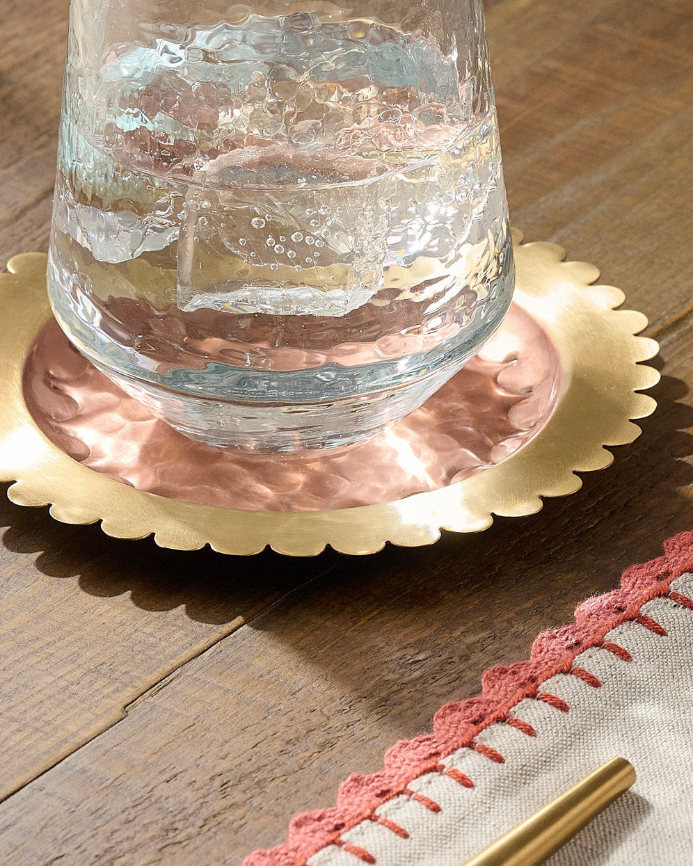 Rustic Glass Stemless Glass shown on coaster