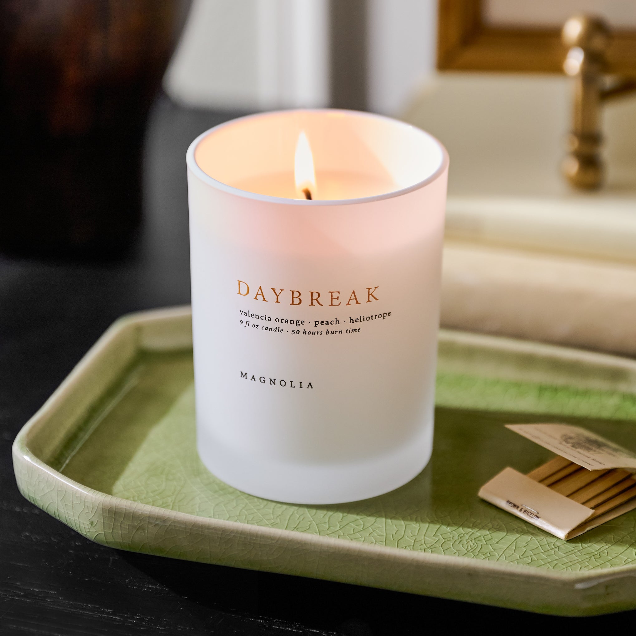 Small Jonah Green Ceramic Tray shown with candle
