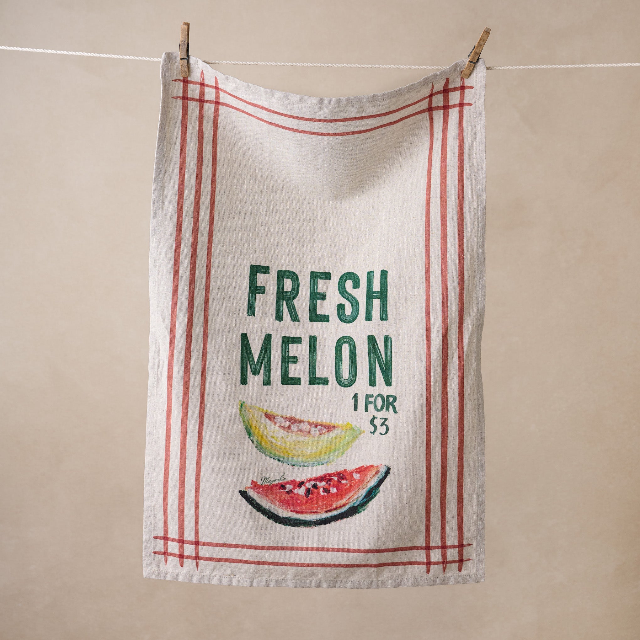 Magnoliass Fresh Melon Tea Towel hanging