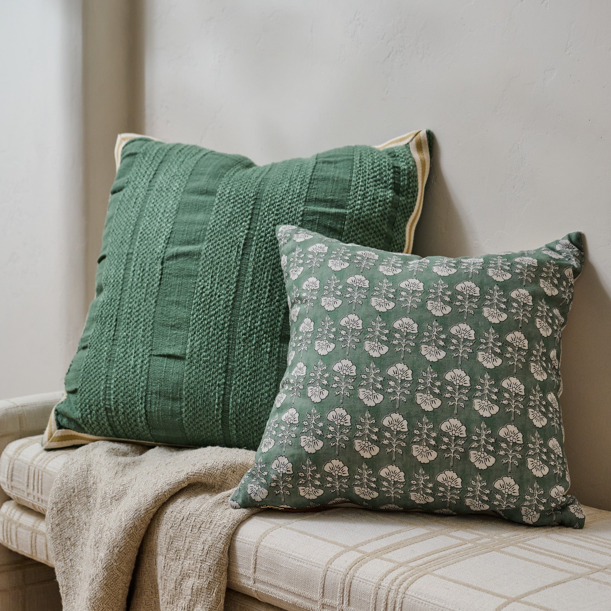 Seaspray Oversized Pillow shown on bench with another pillow