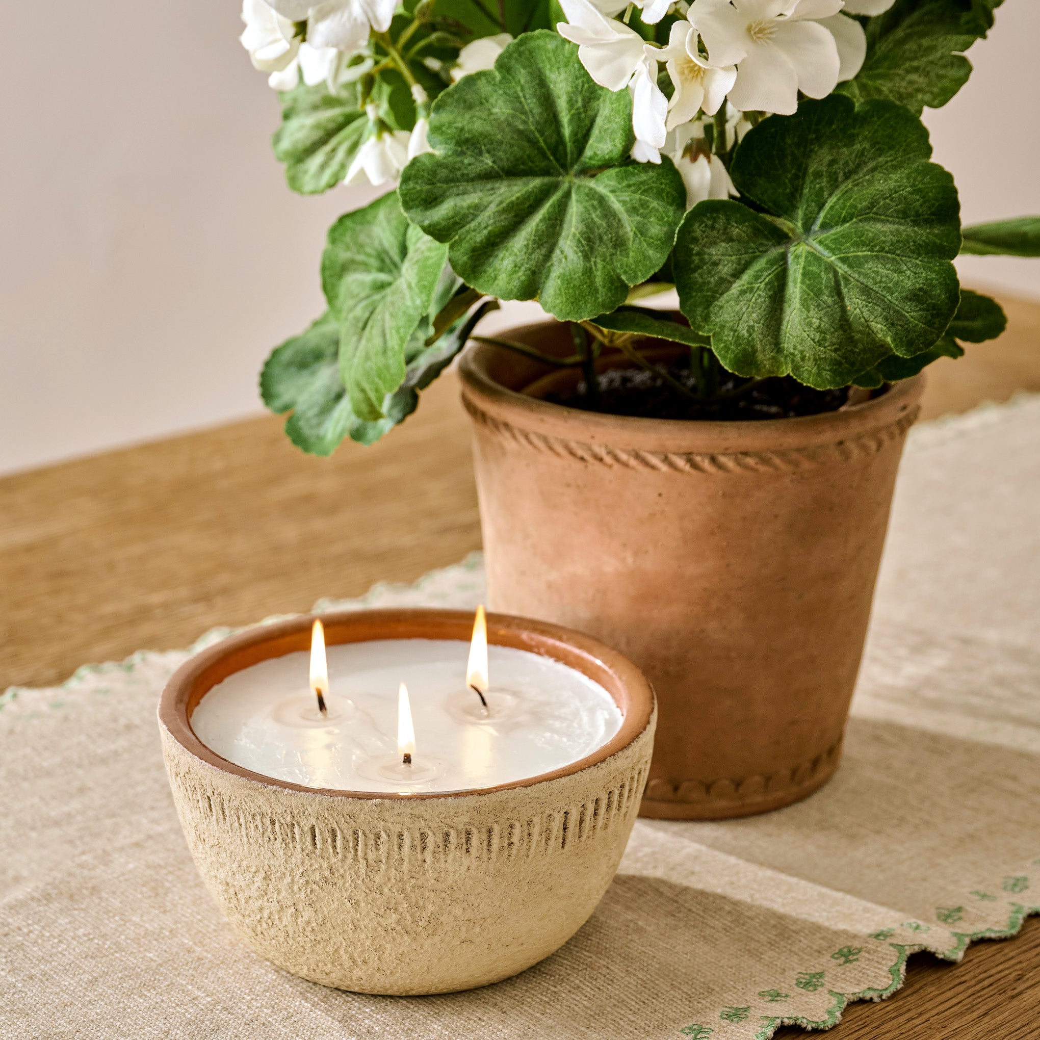 Magnoliass Daybreak Rustic Bowl Candle shown on table