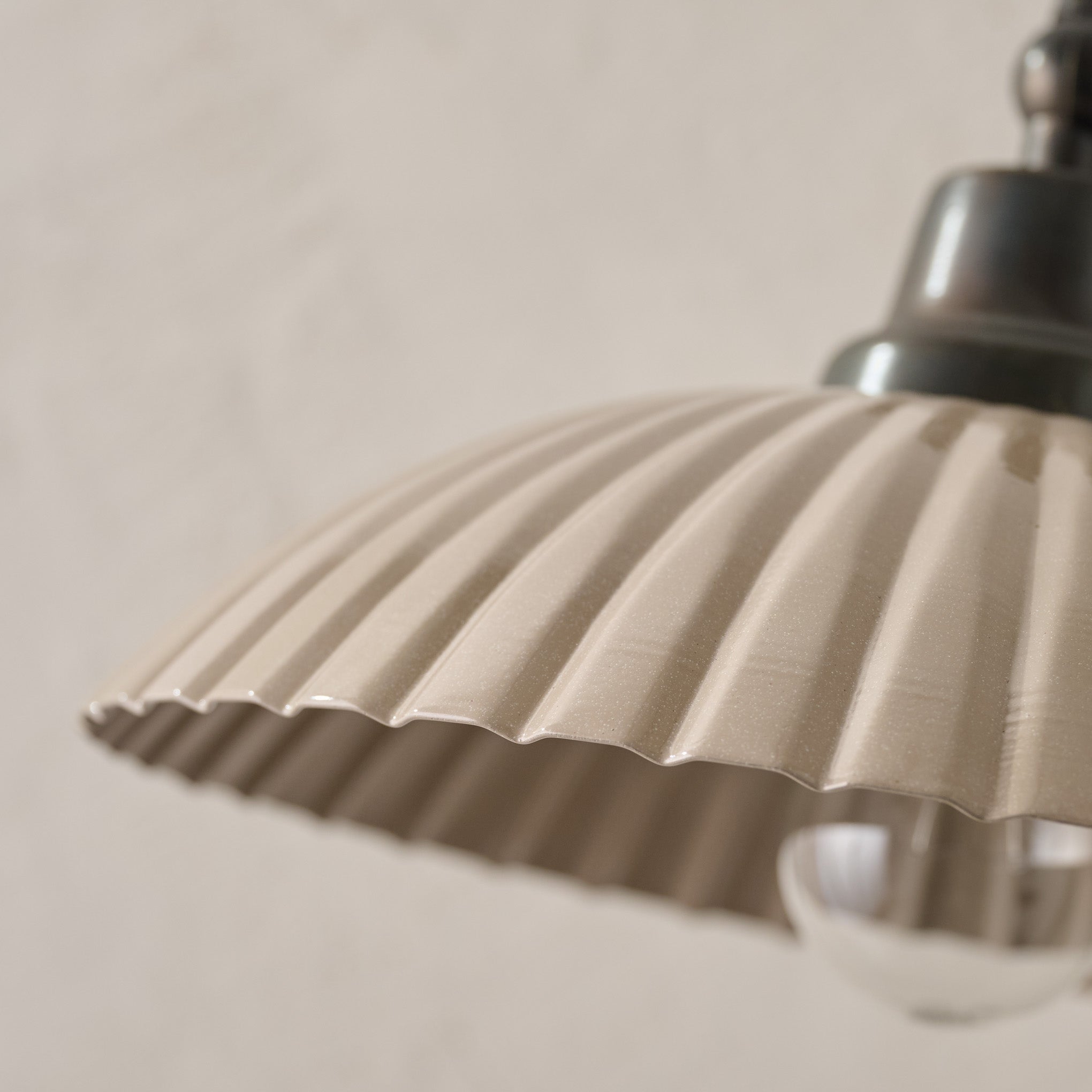 Chester Enamel Plug-in Sconce - Taupe with Bronze up close