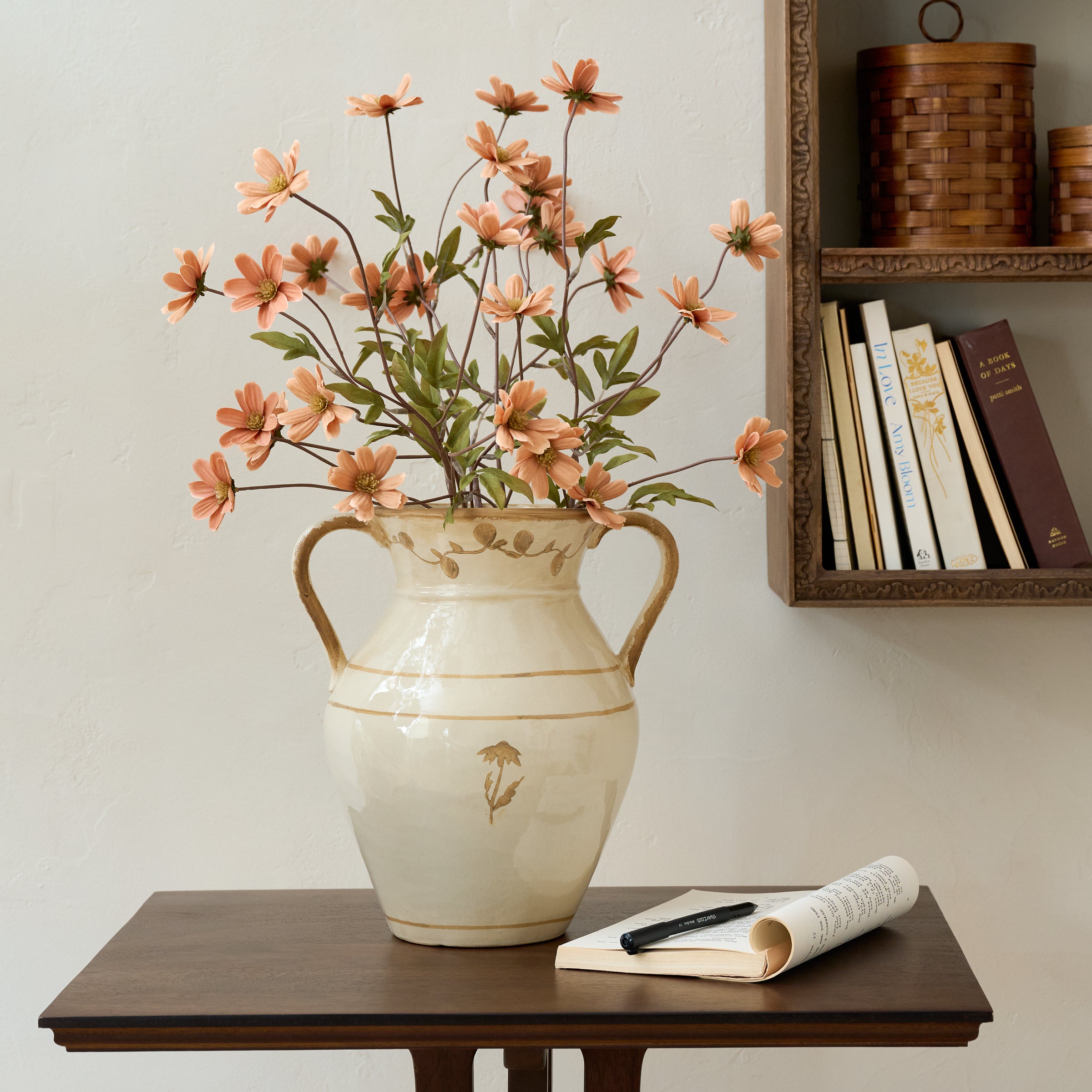 Light Amber Cosmos Stem shown in vase on accent table