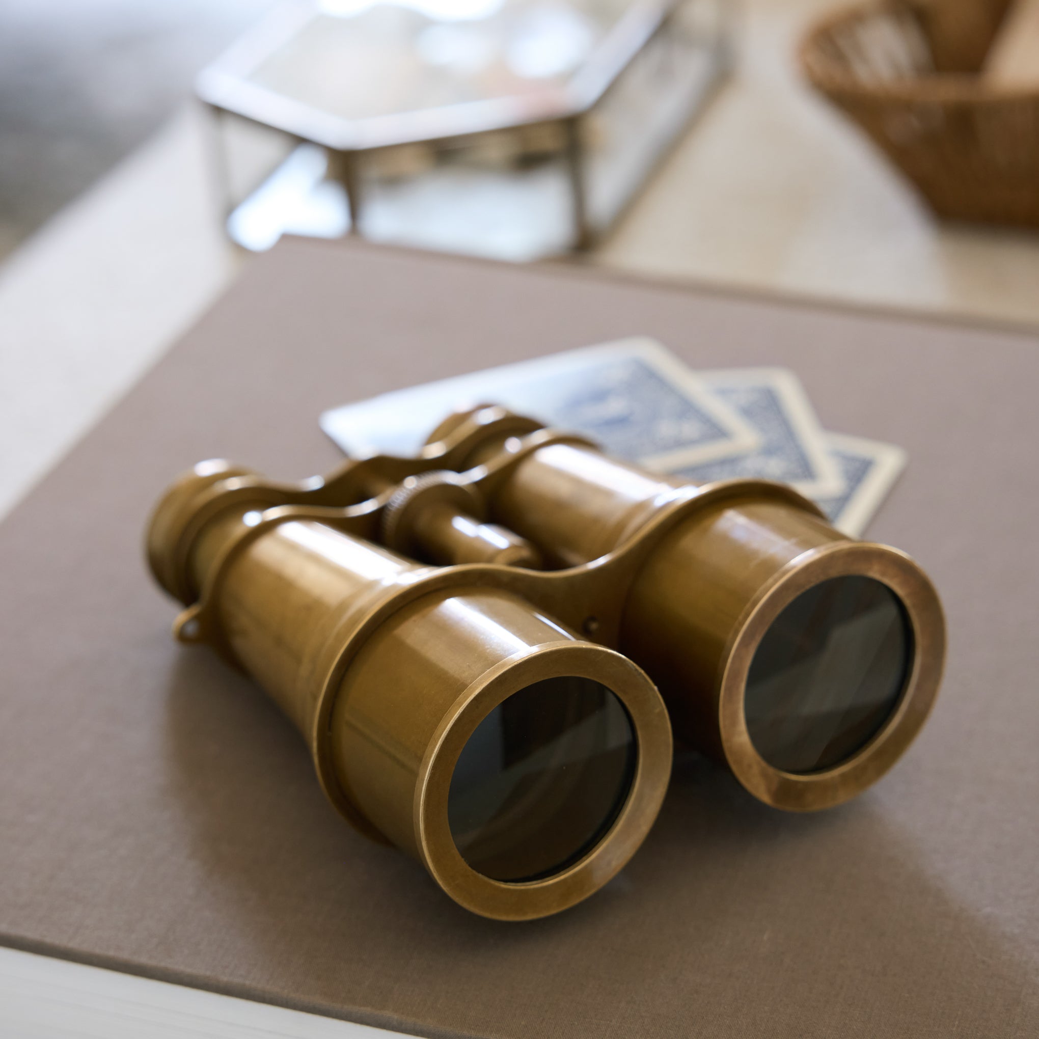 Decorative Solid Brass Binoculars on a coffee table