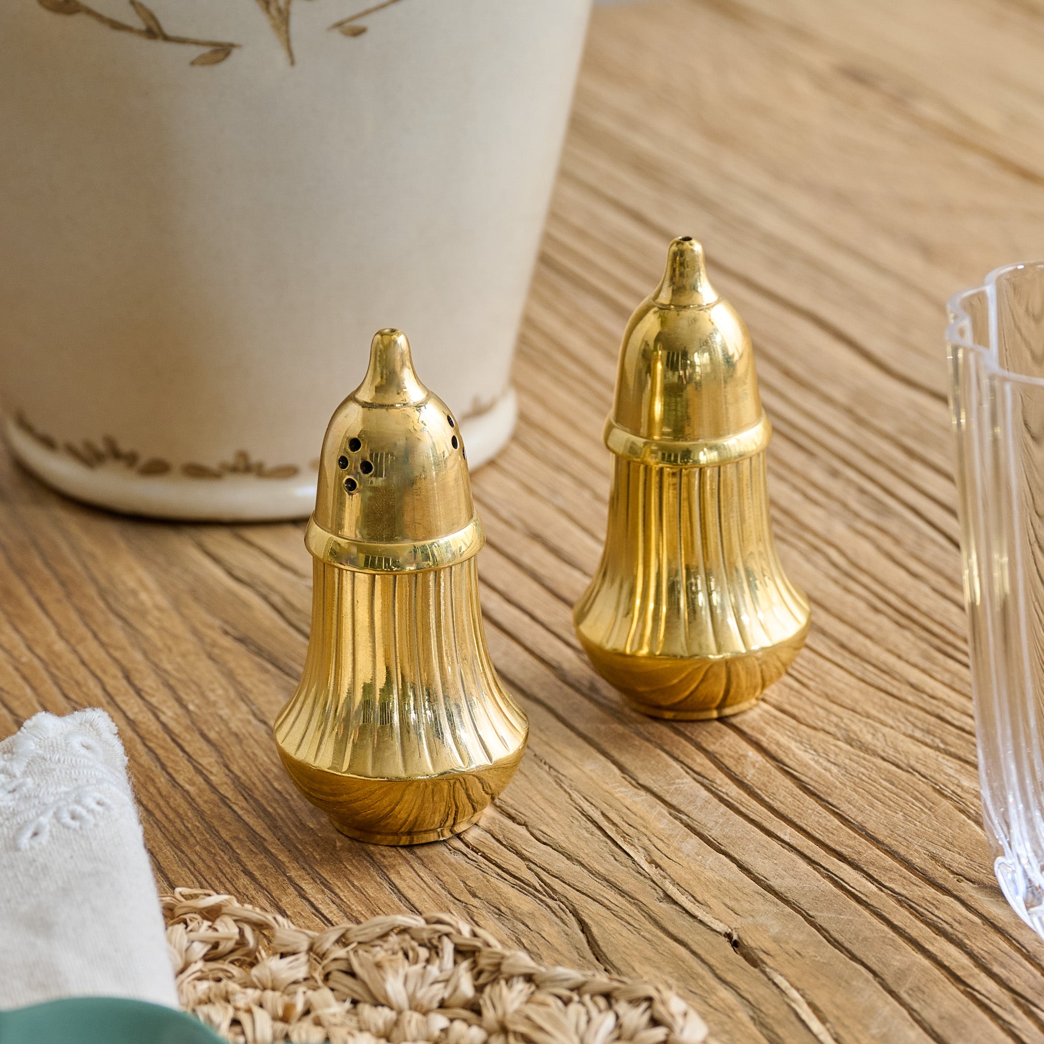 Brass Salt + Pepper Set shown on table