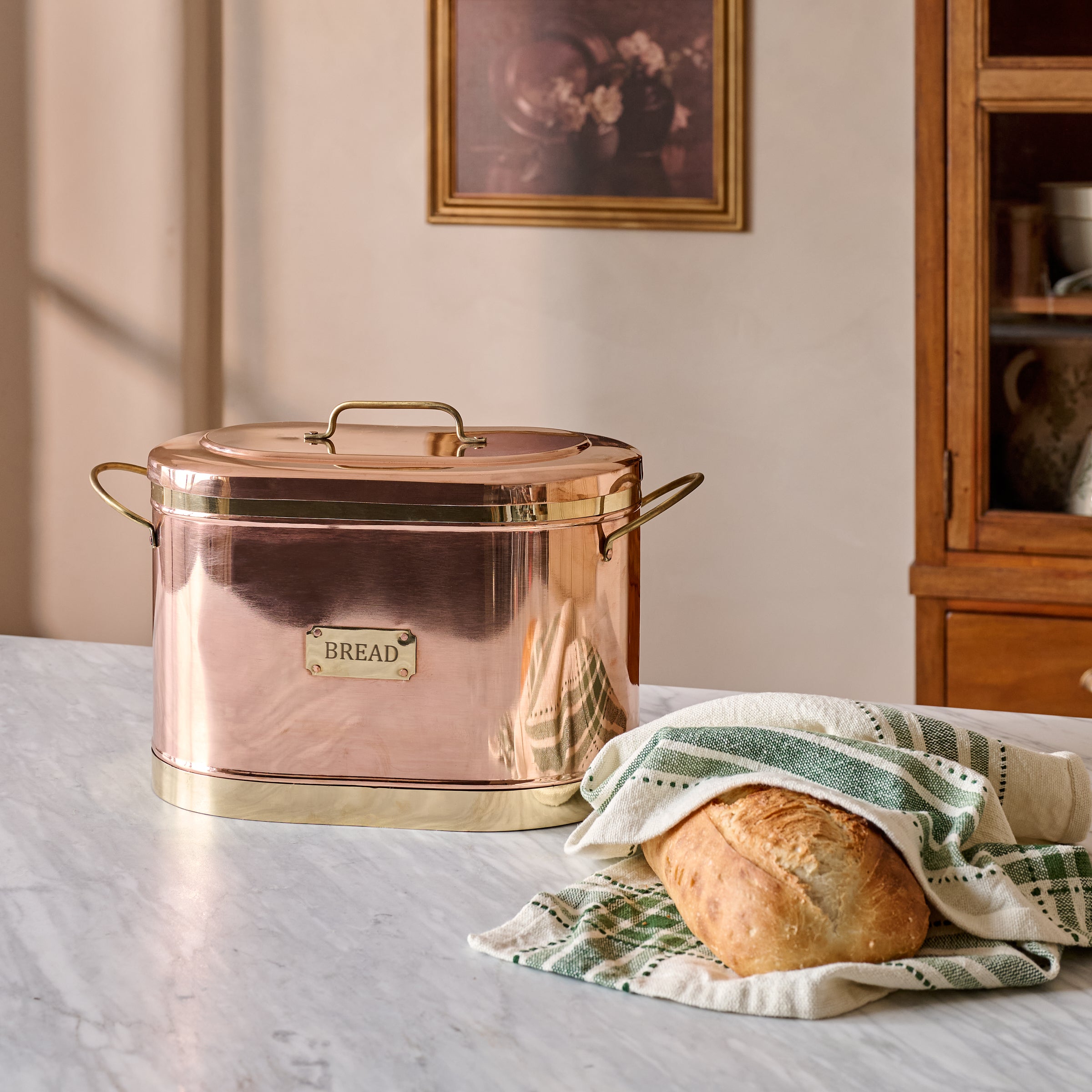 Magnoliass Copper Bread Box shown on counter
