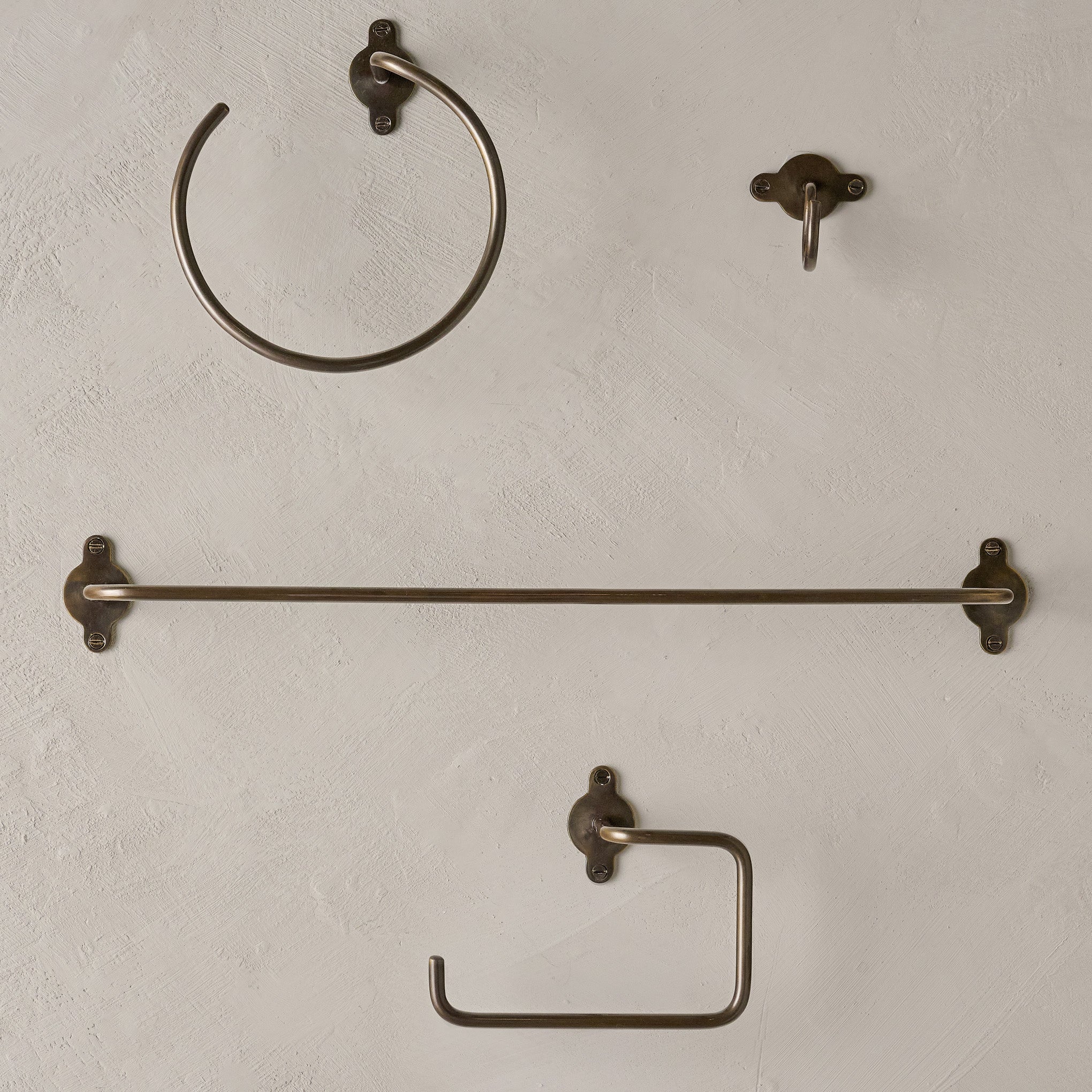 Antique Bronze Metal Towel Ring shown with other bath hardware