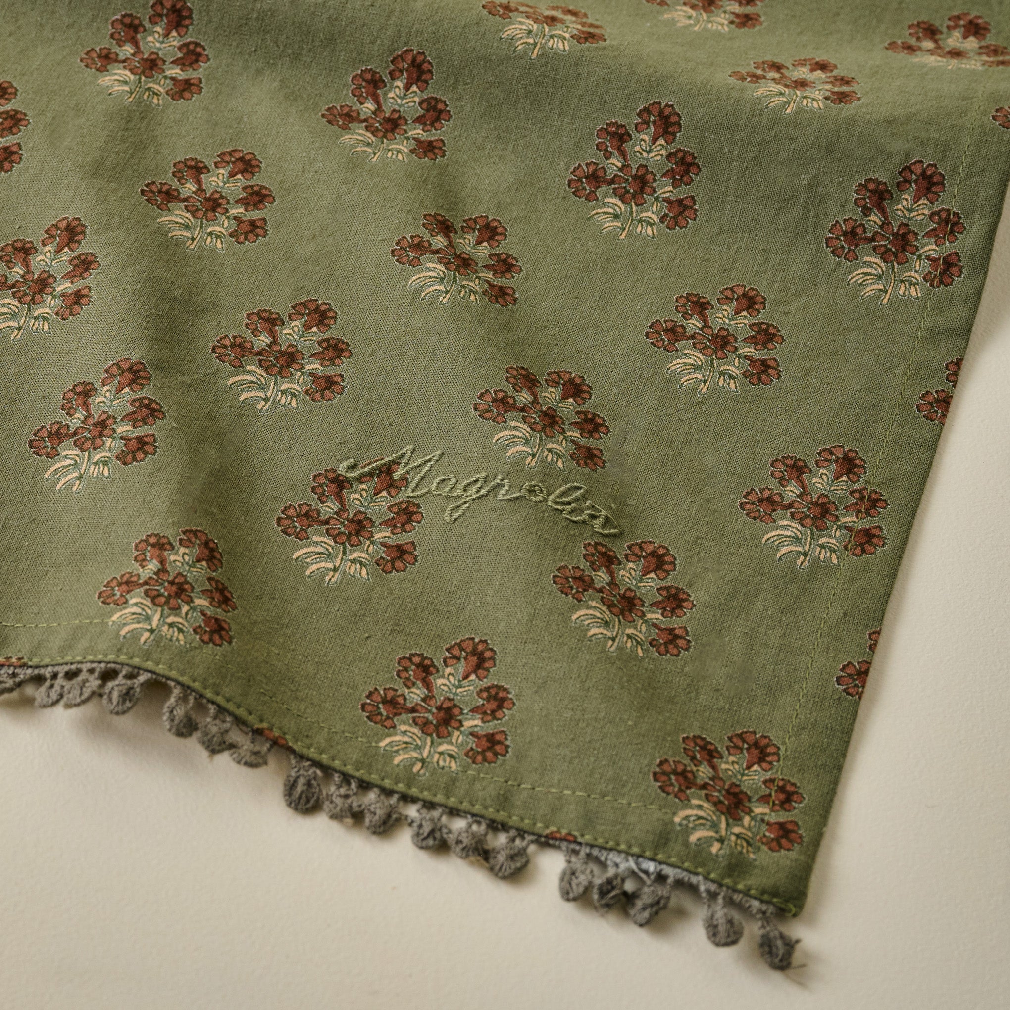 Magnoliass Olive Green Block Printed Tea Towel corner up close