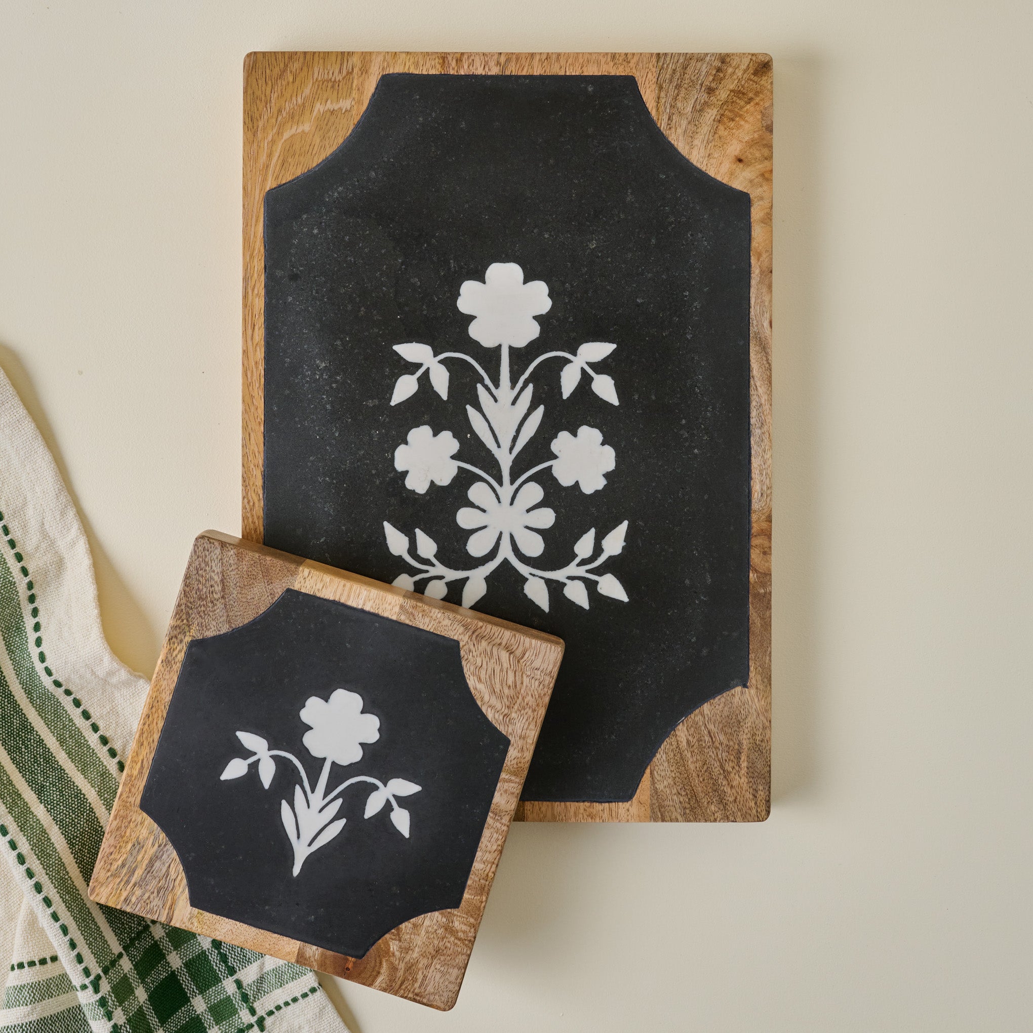 Elenora Marble Serving Board shown with trivet