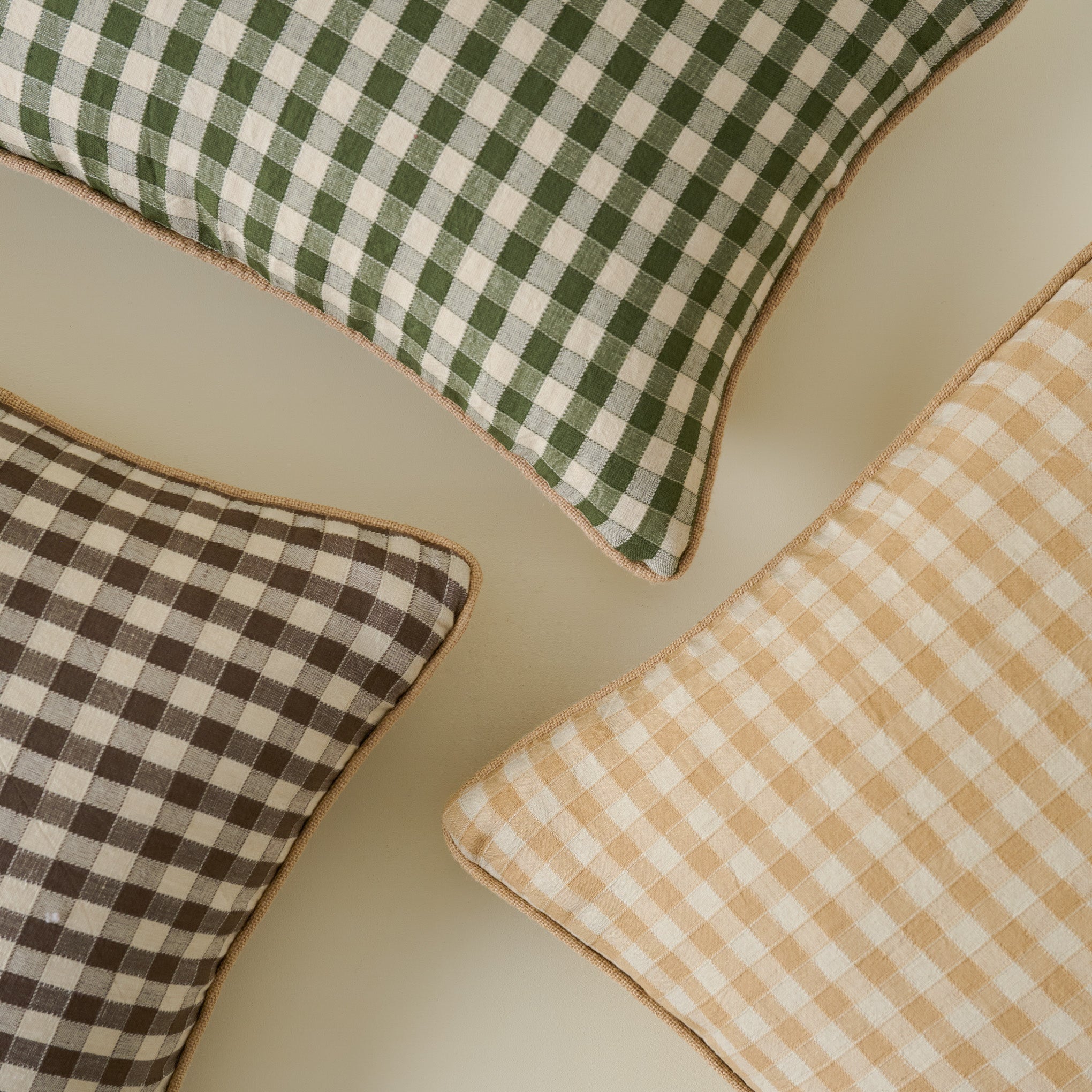 Gingham Small Lumbar Pillow shown with other gingham pillows
