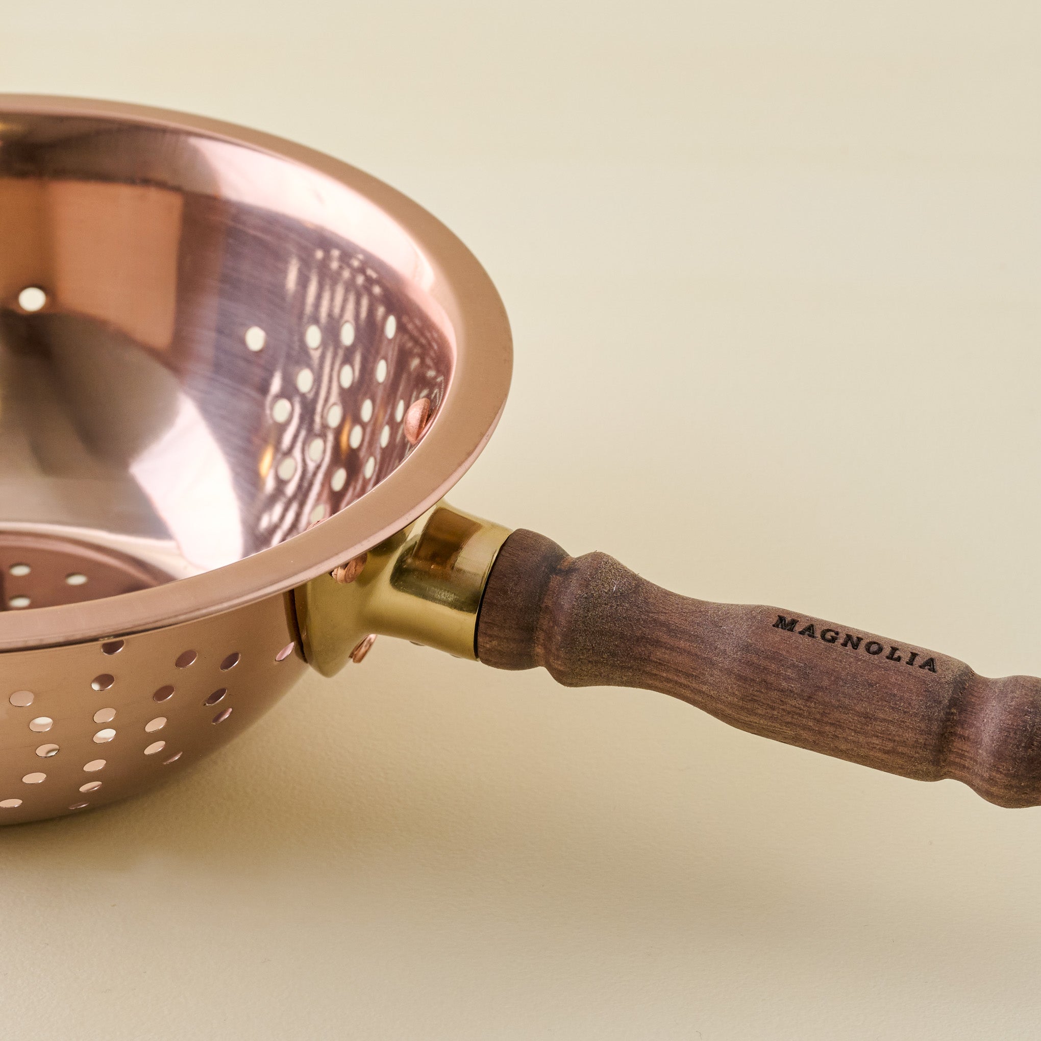 Walnut Handle Copper Colander close up
