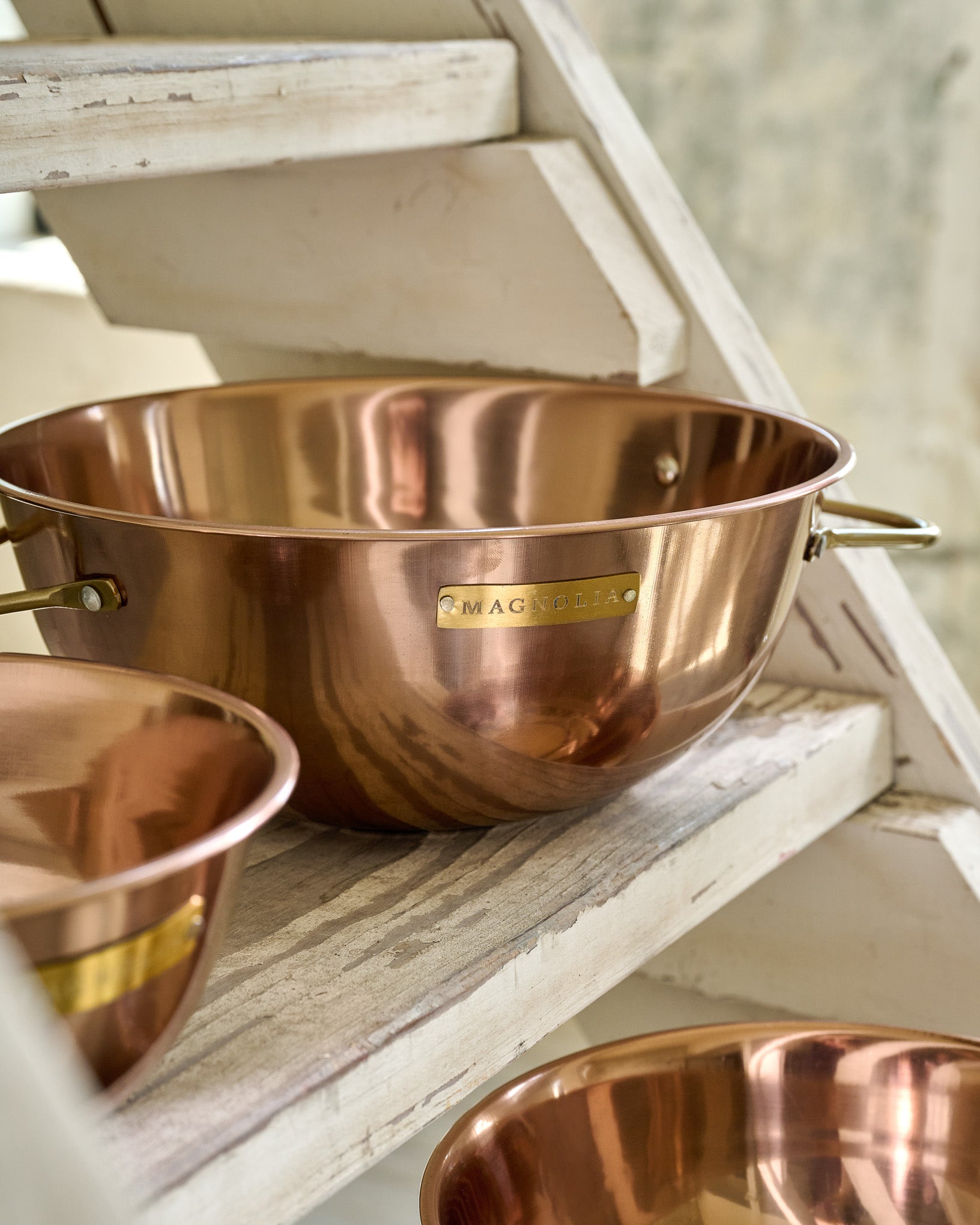 Magnoliass Copper Mixing Bowl Set close up on stairs