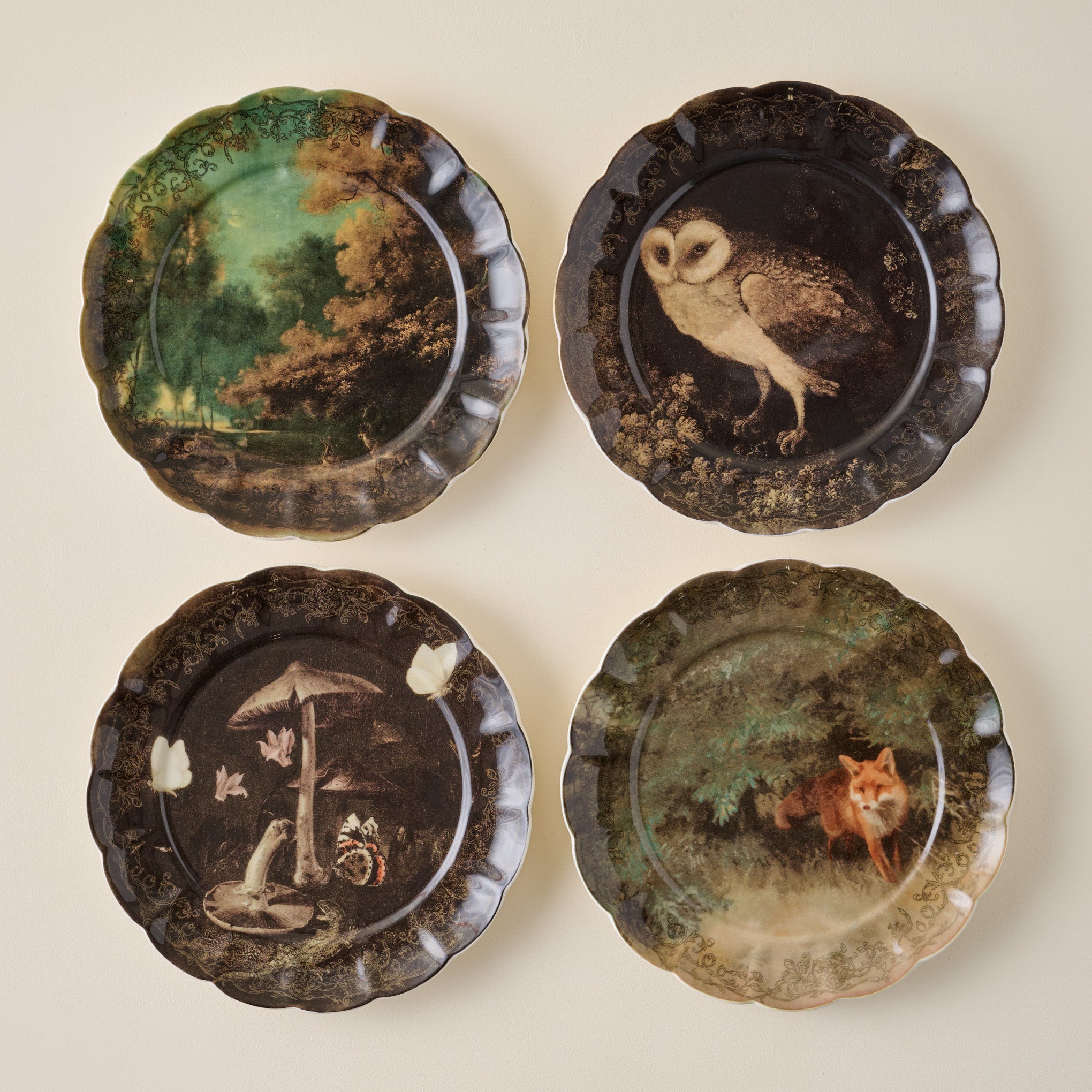 Enchanted Forest Landscape Dessert Plate shown with other Enchanted Forest plates
