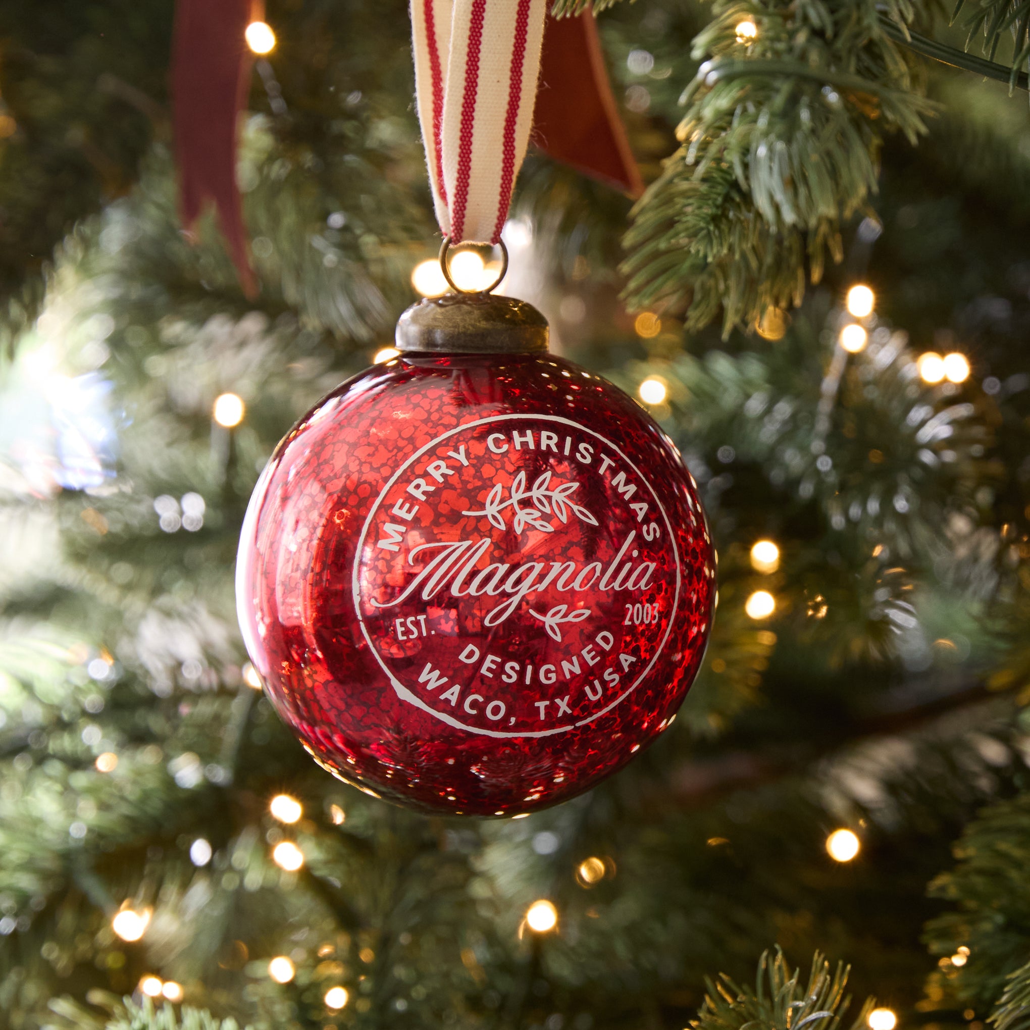 Magnoliass Mercury Glass Ornament on a tree