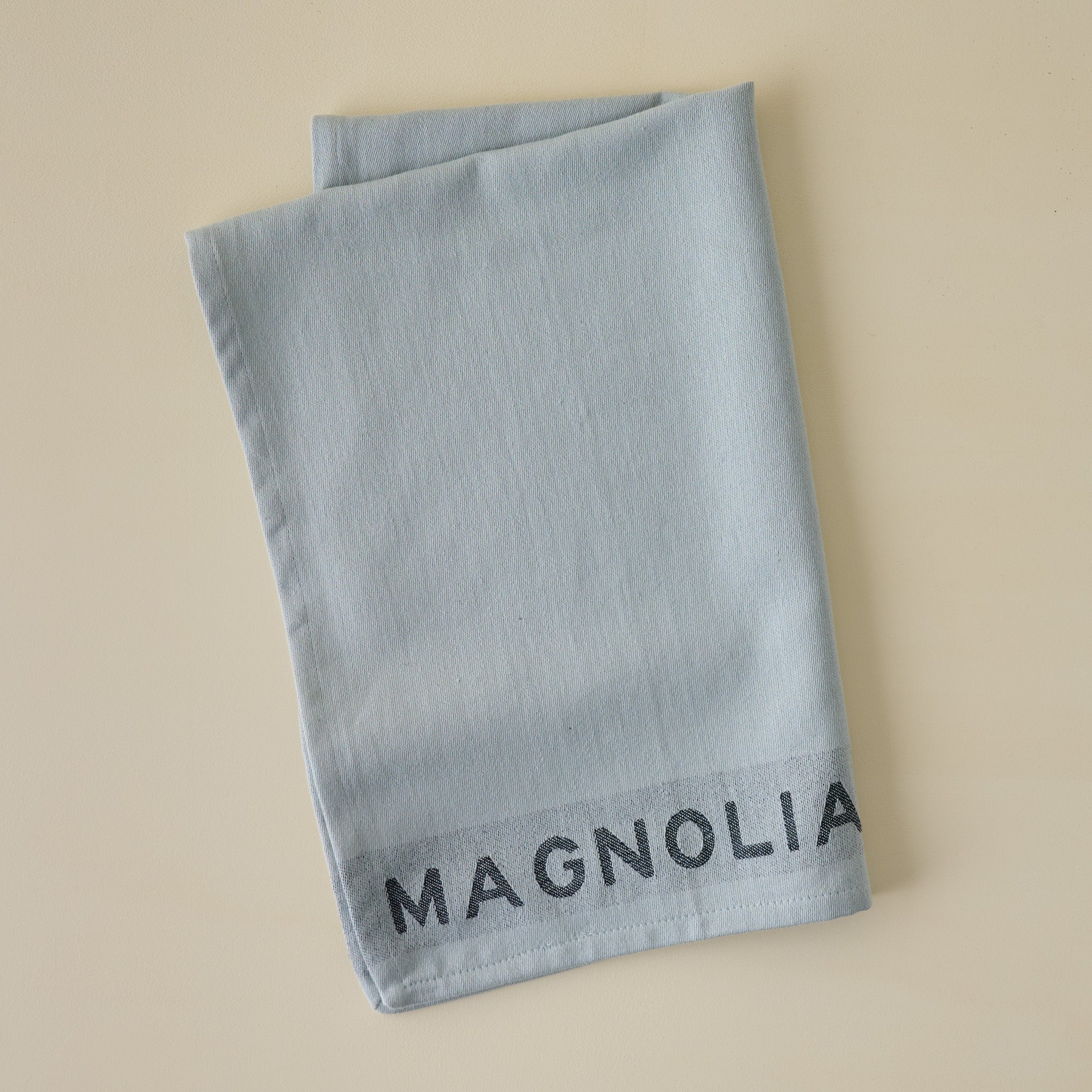 Magnoliass Est. Jacquard Tea Towel - Blue folded