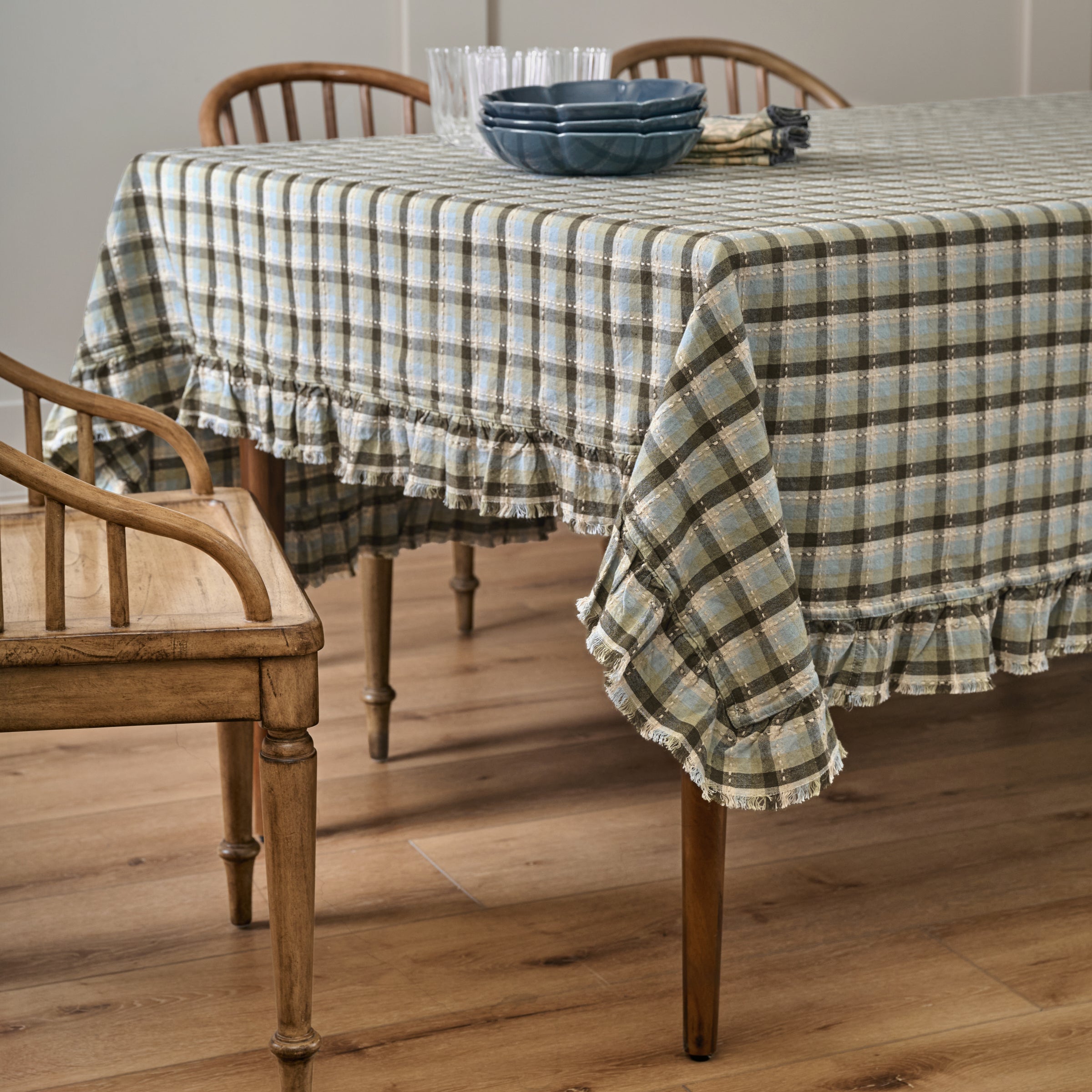 Olive Stone Tablecloth placed on table