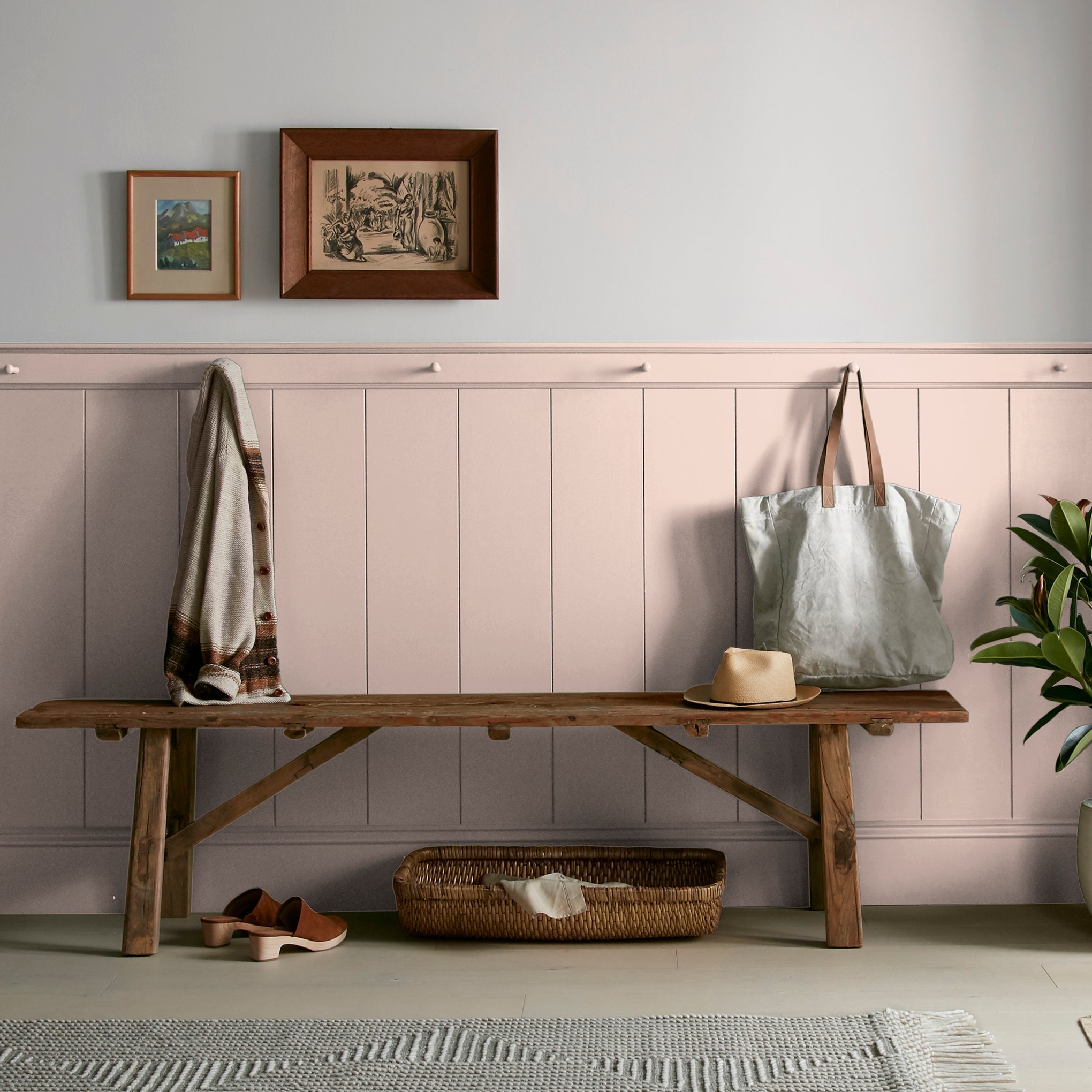 Pale neutral pink with accents of peach paint named ella rose shown painted on entryway wall