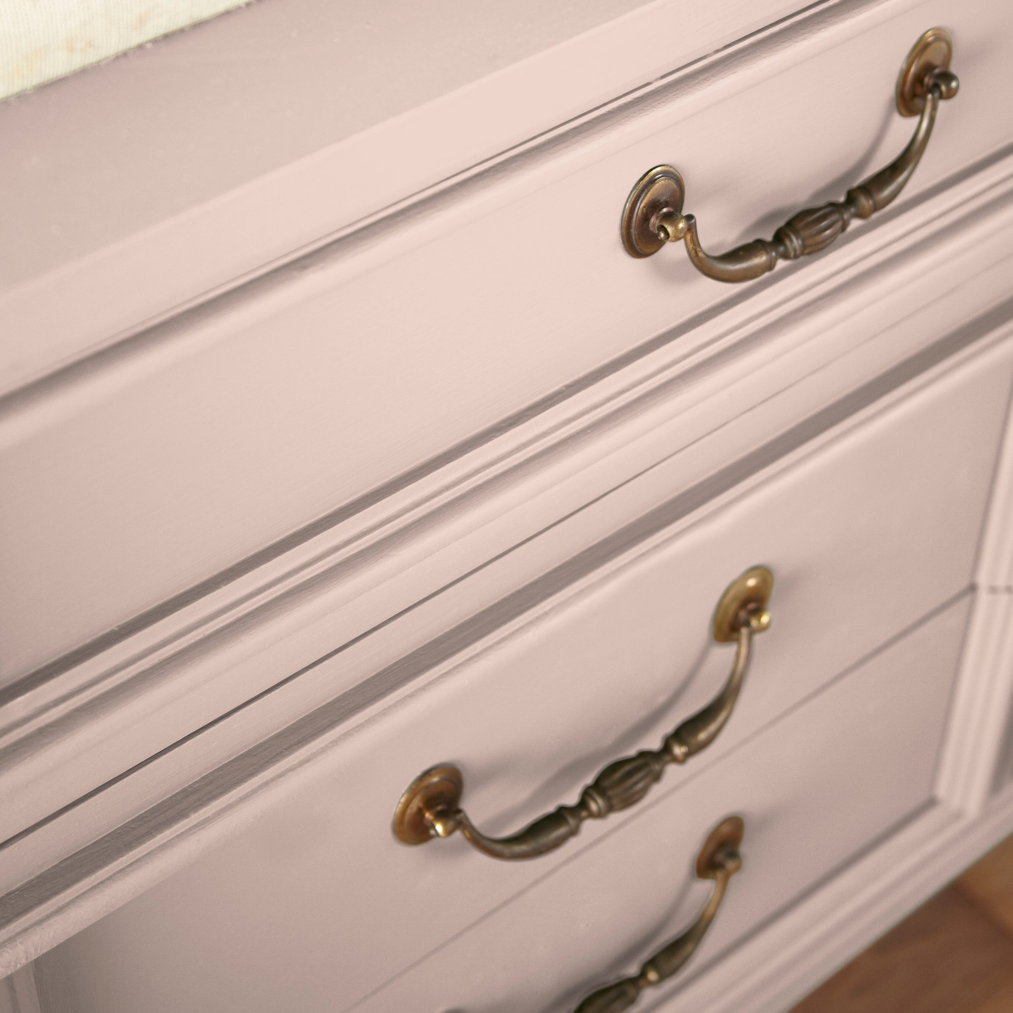 Pale neutral pink with peach door and cabinet paint named ella rose shown painted on cabinet