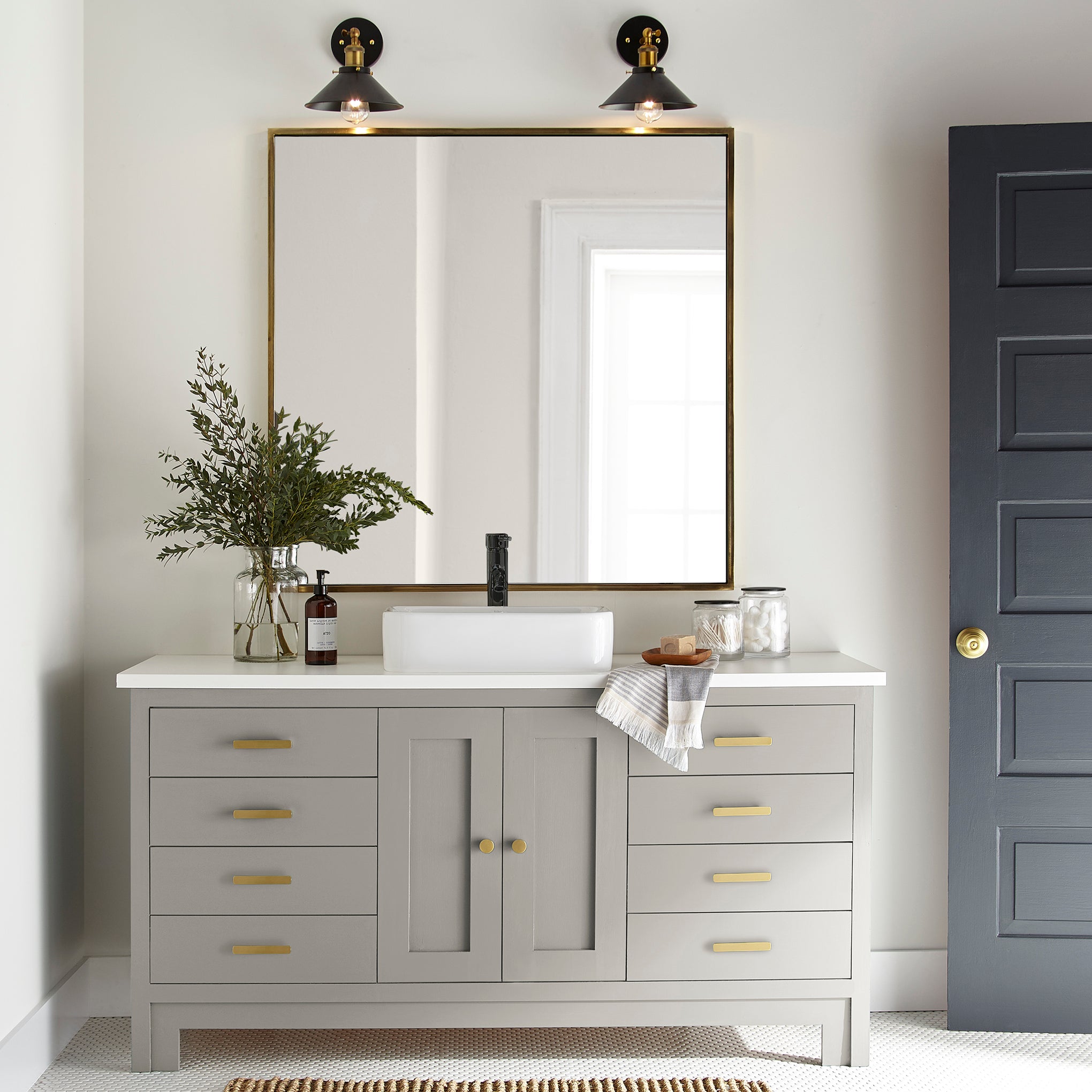medium warm grey paint named sunday stroll shown painted on bathroom cabinet